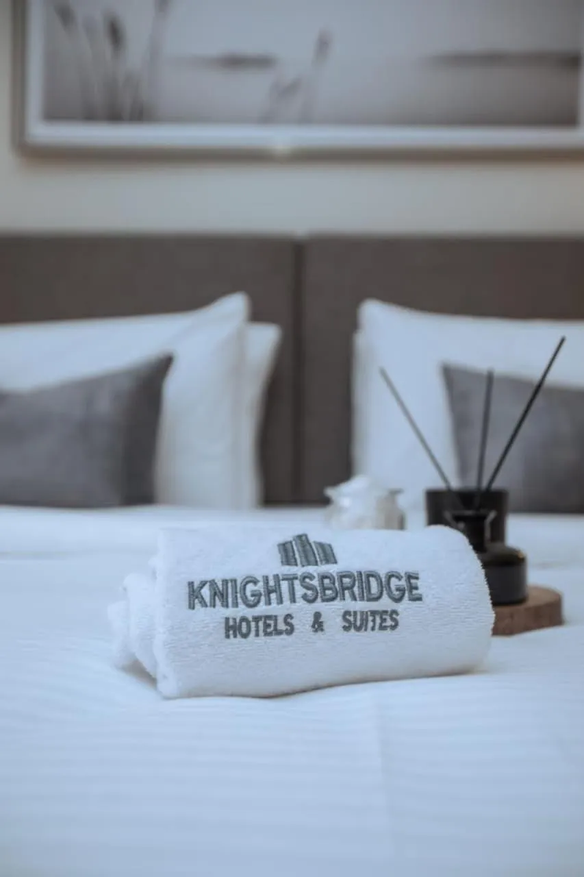 Bed in Knightsbridge Hotel & Suites