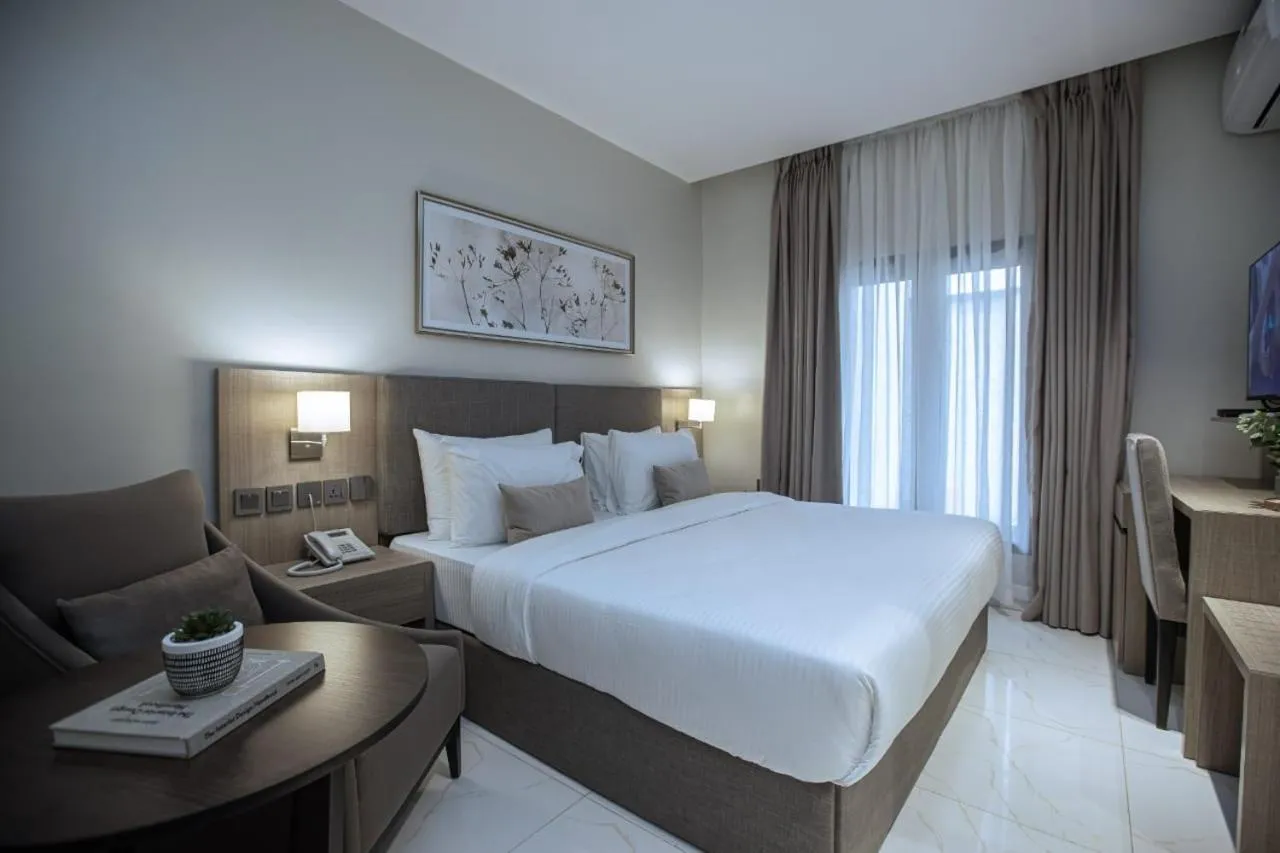 Bed in Knightsbridge Hotel & Suites