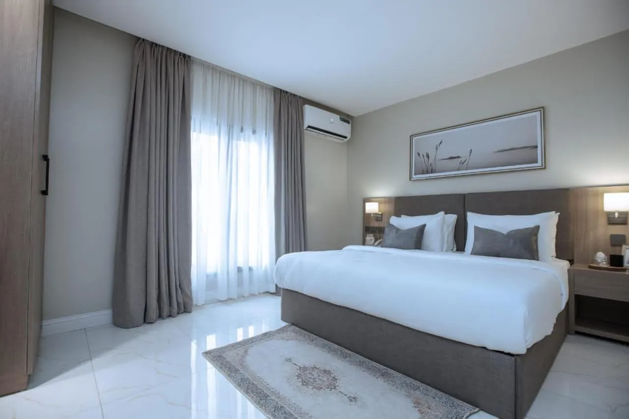 Bed in Knightsbridge Hotel & Suites