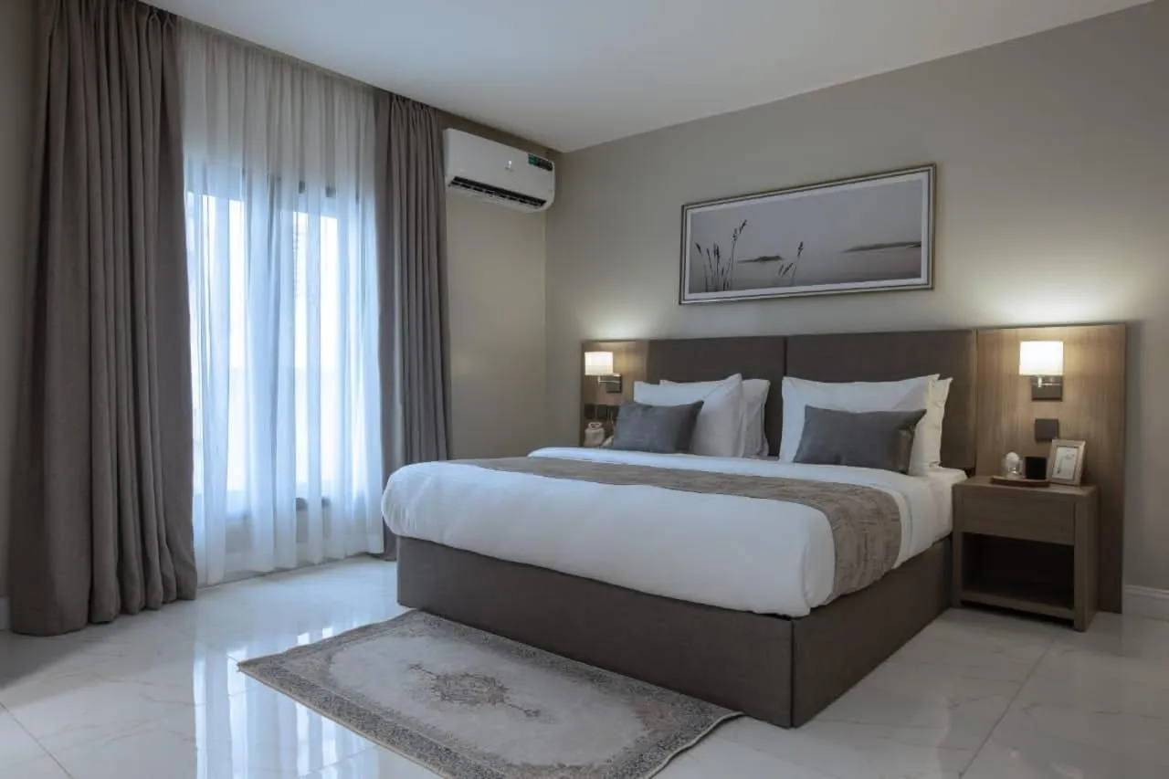 Bed in Knightsbridge Hotel & Suites