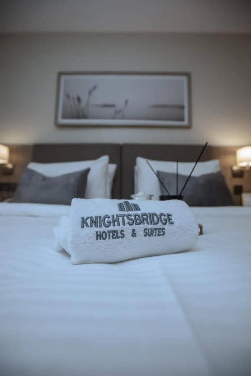 Bed in Knightsbridge Hotel & Suites