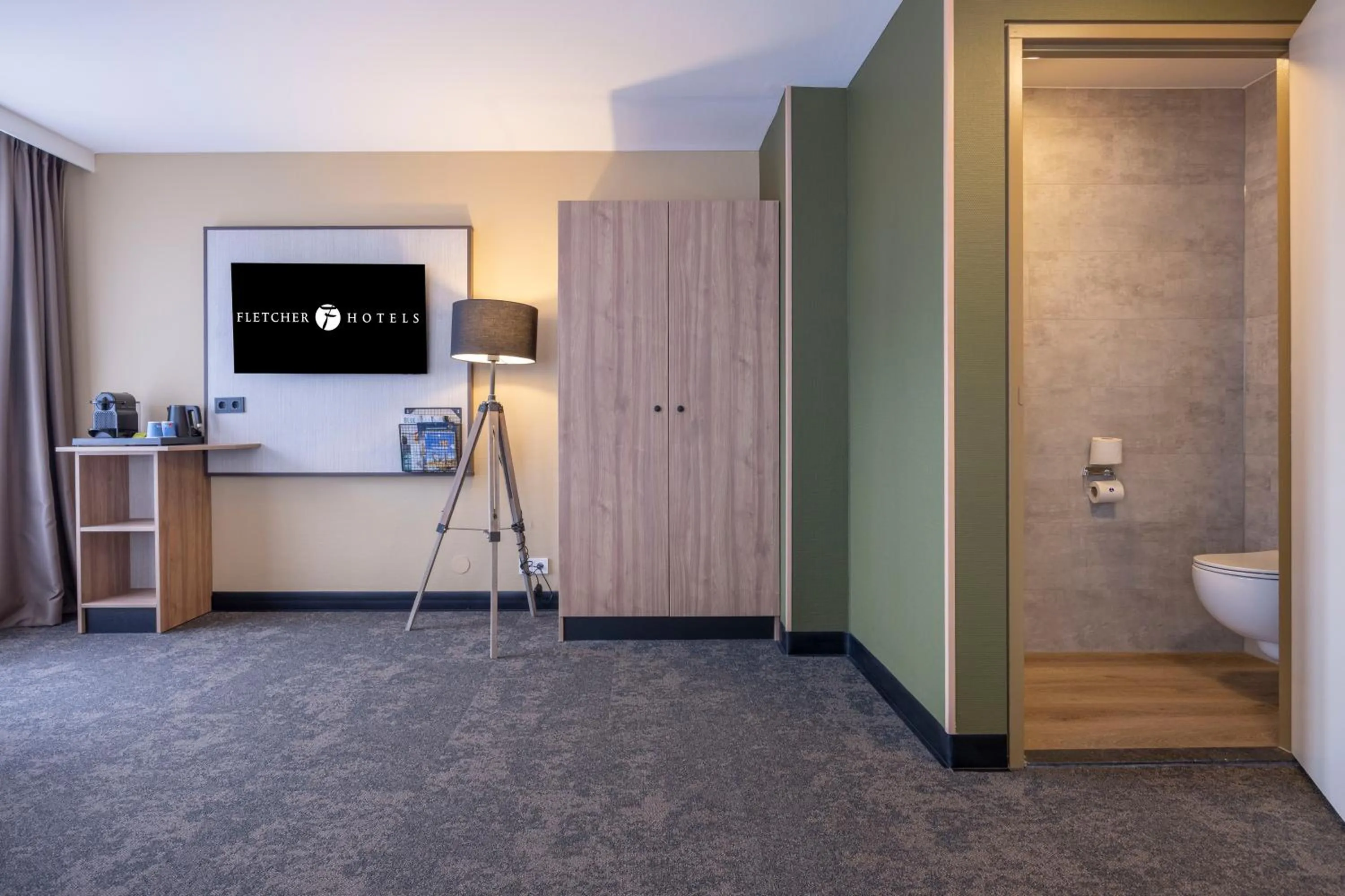 TV and multimedia in Fletcher Hotel-Restaurant Klein Zwitserland