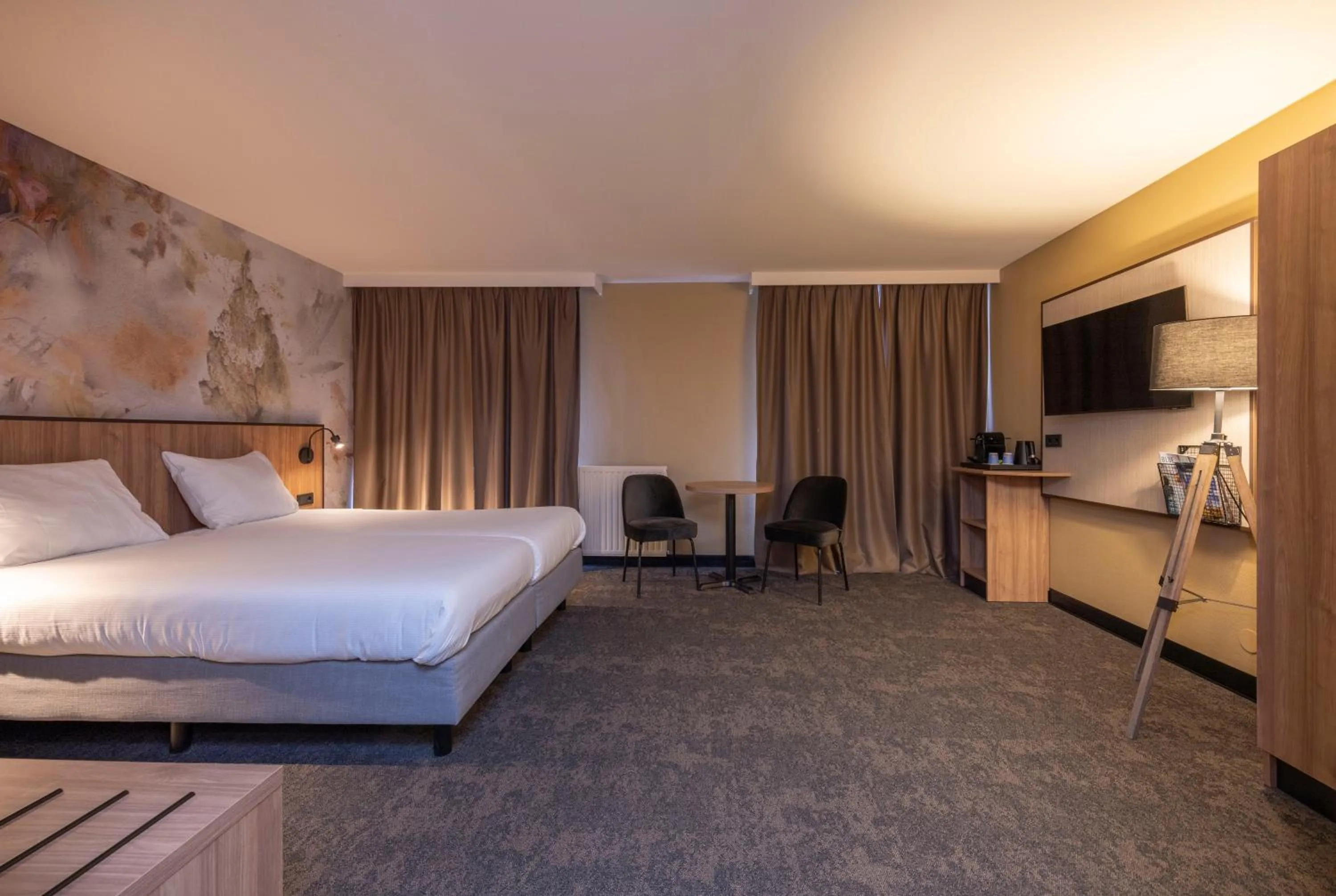 Bed in Fletcher Hotel-Restaurant Klein Zwitserland