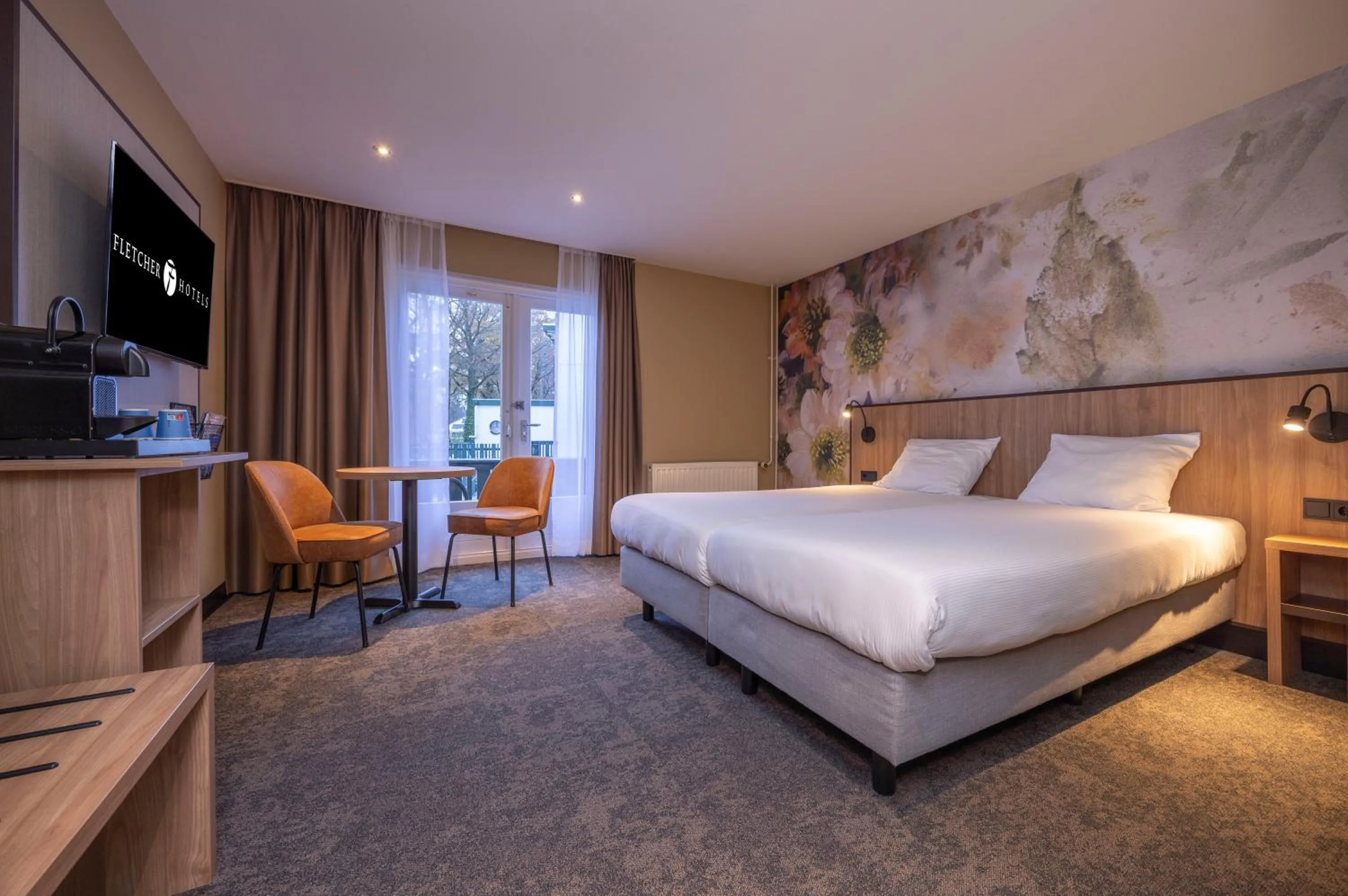 Photo of the whole room, Bed in Fletcher Hotel-Restaurant Klein Zwitserland