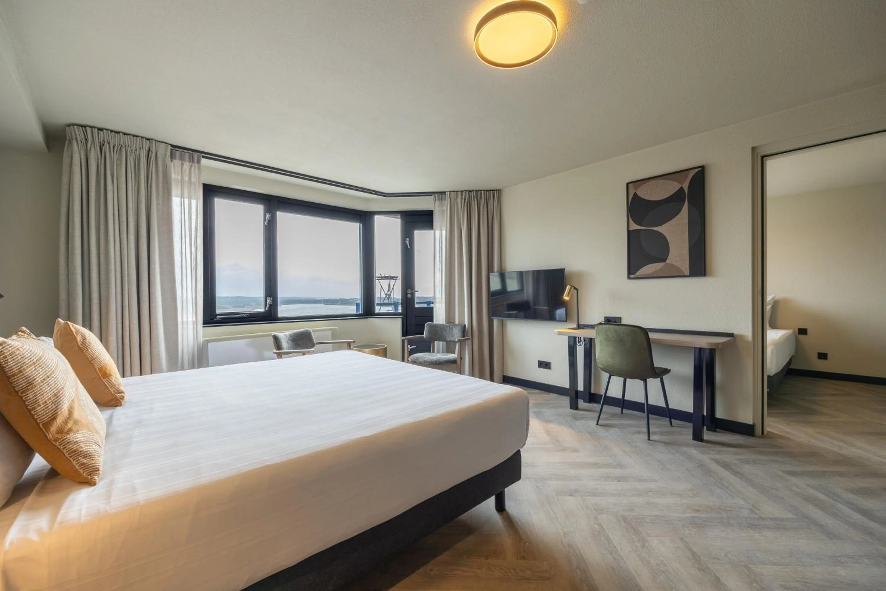 Photo of the whole room, Bed in Leonardo Hotel IJmuiden Seaport Beach