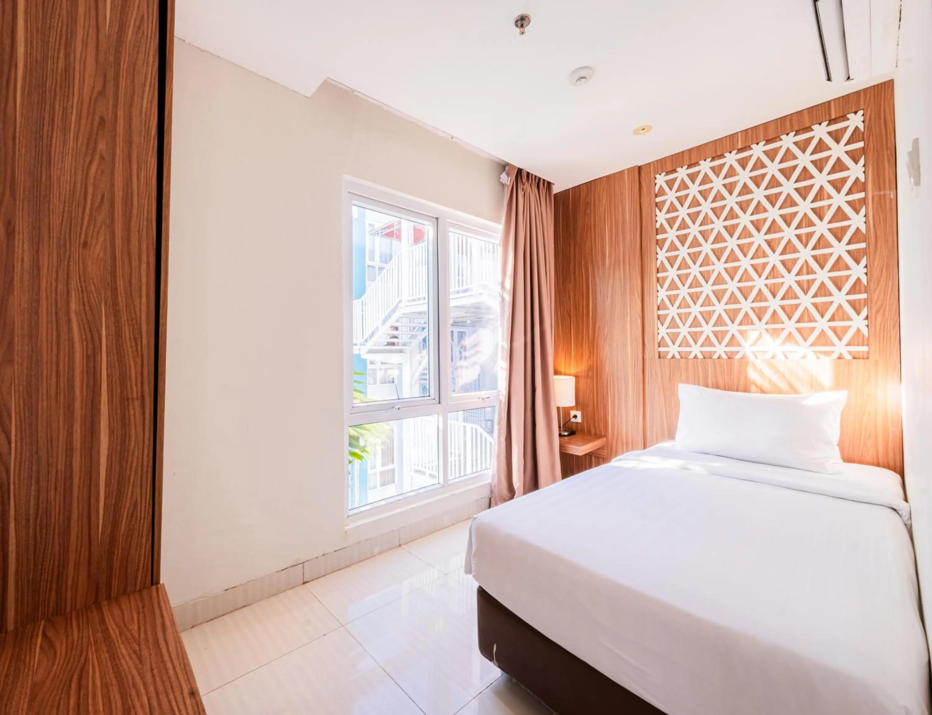 Bedroom, Bed in Astara Hotel Balikpapan