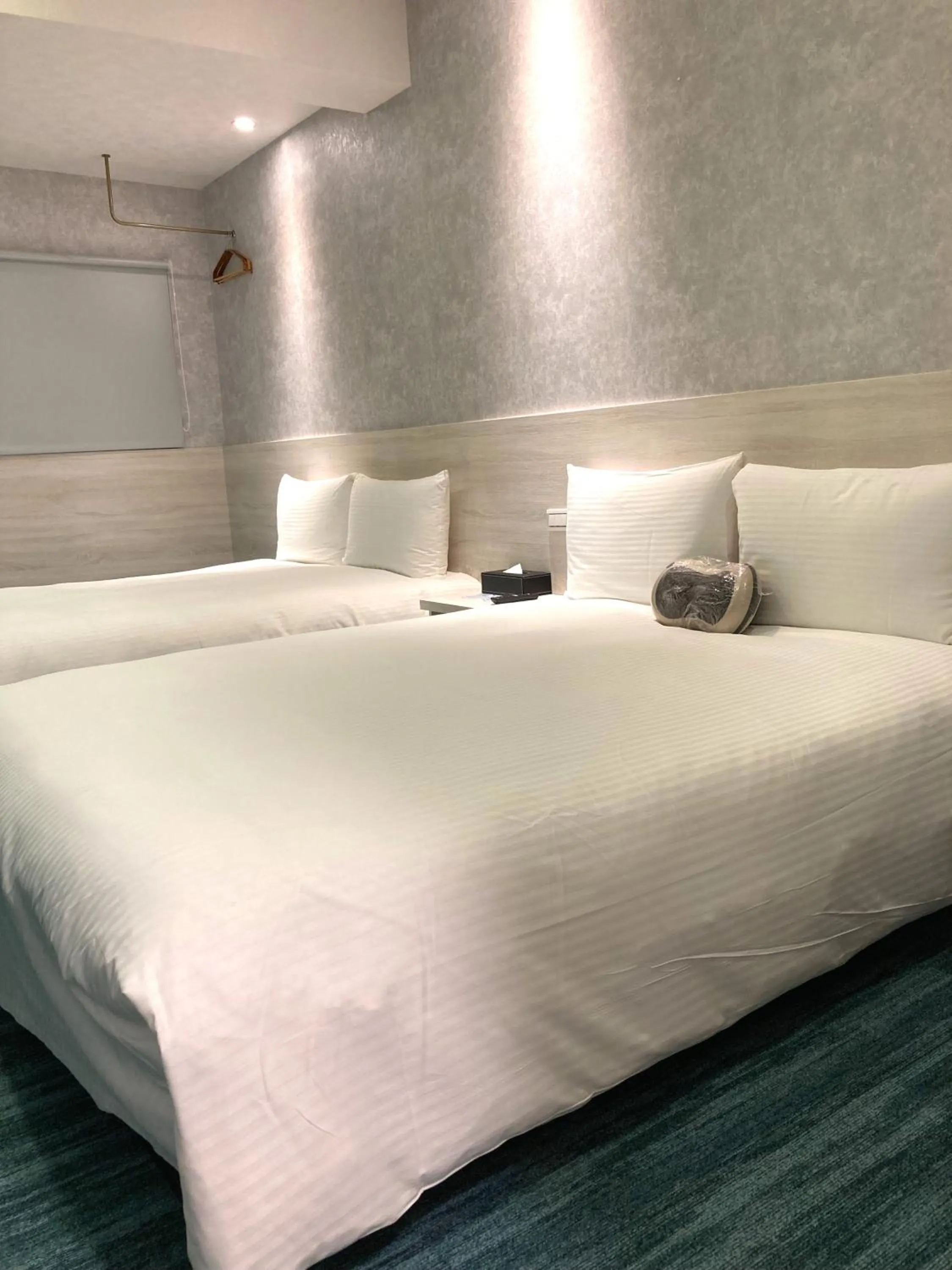Bed in 西門雲町旅店 Sky Gate Hotel