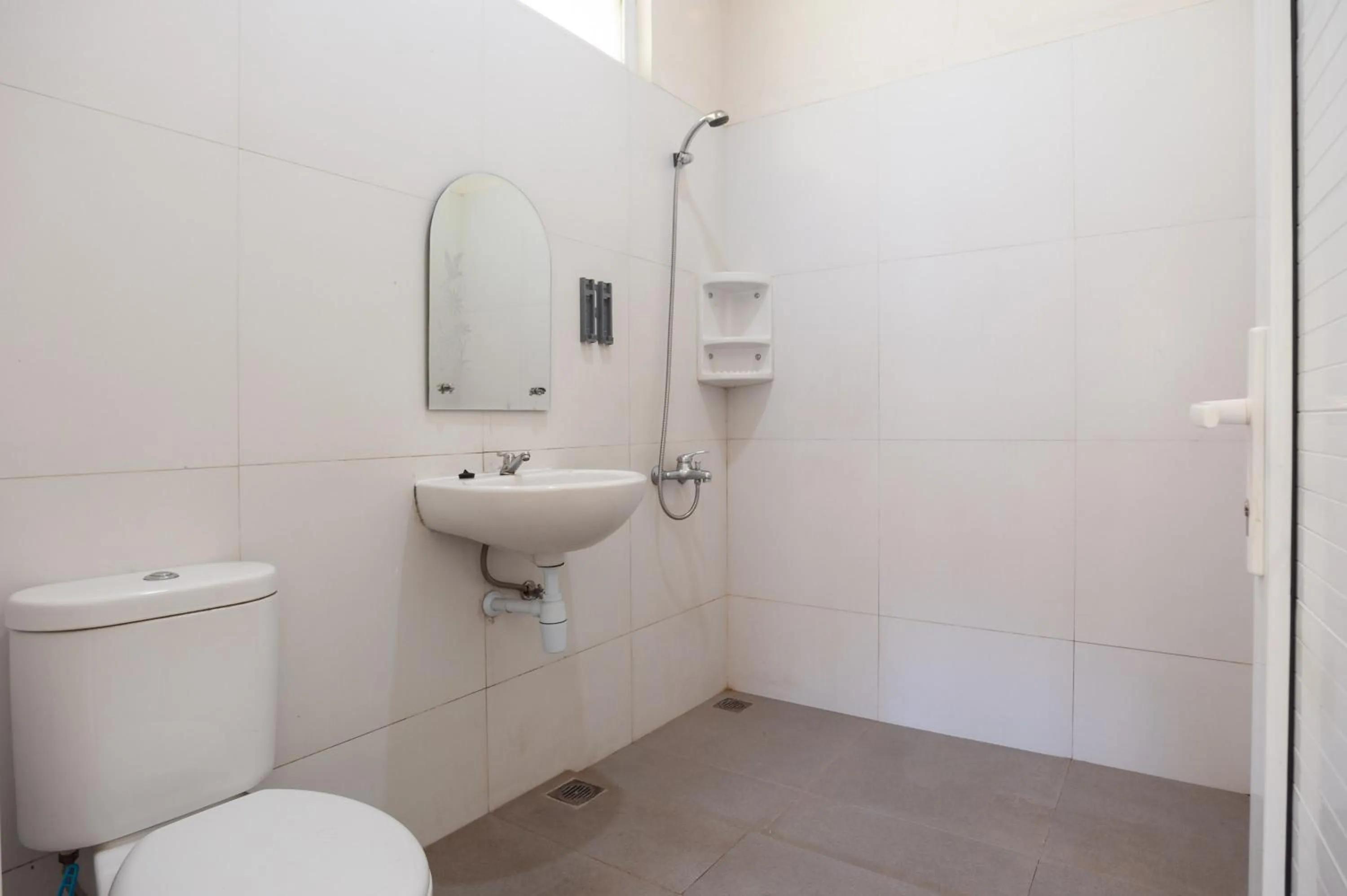 Bathroom in Urbanview Resort Adang Zecky Cisarua Puncak by RedDoorz