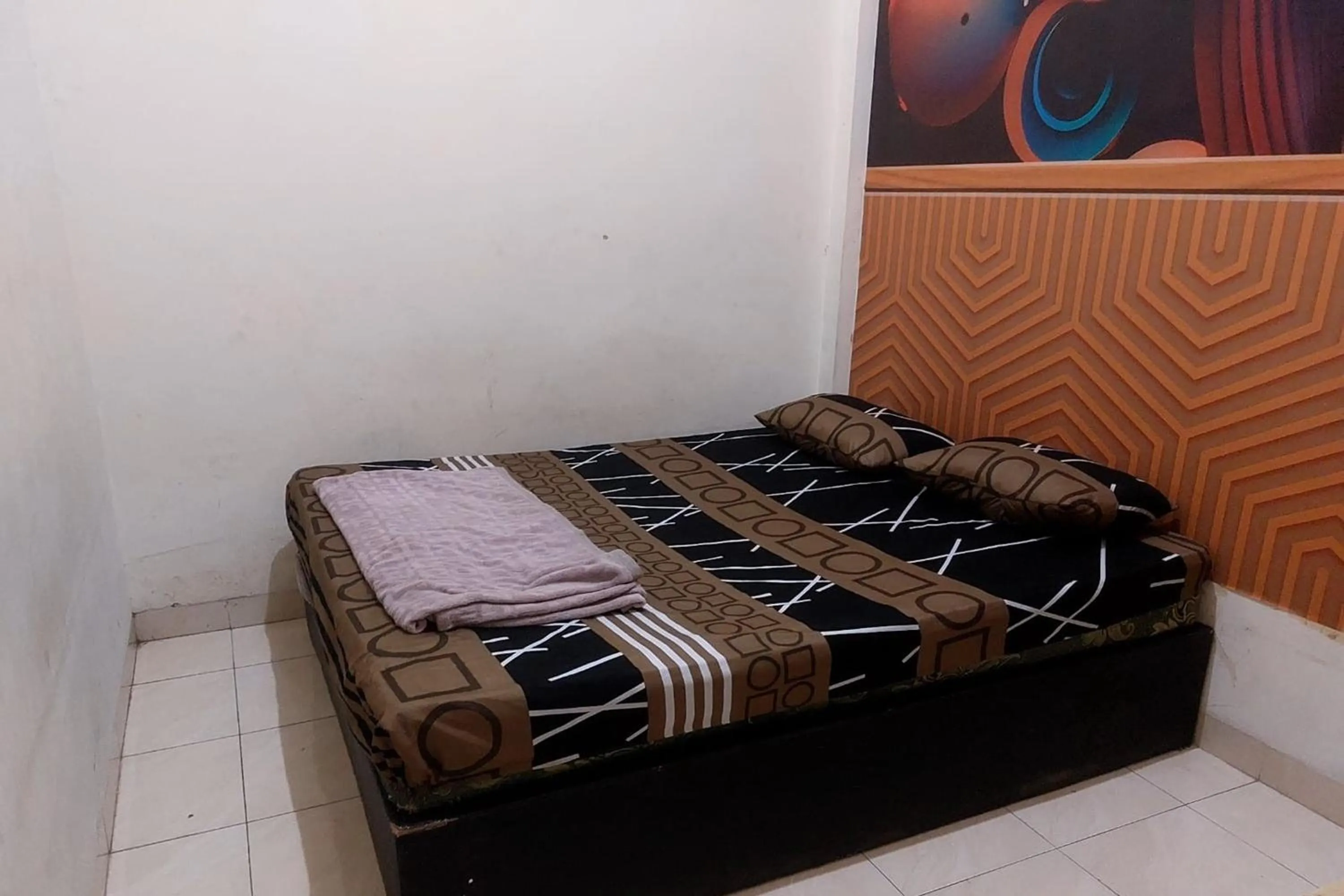 Bed in Guest House Idola Palopo