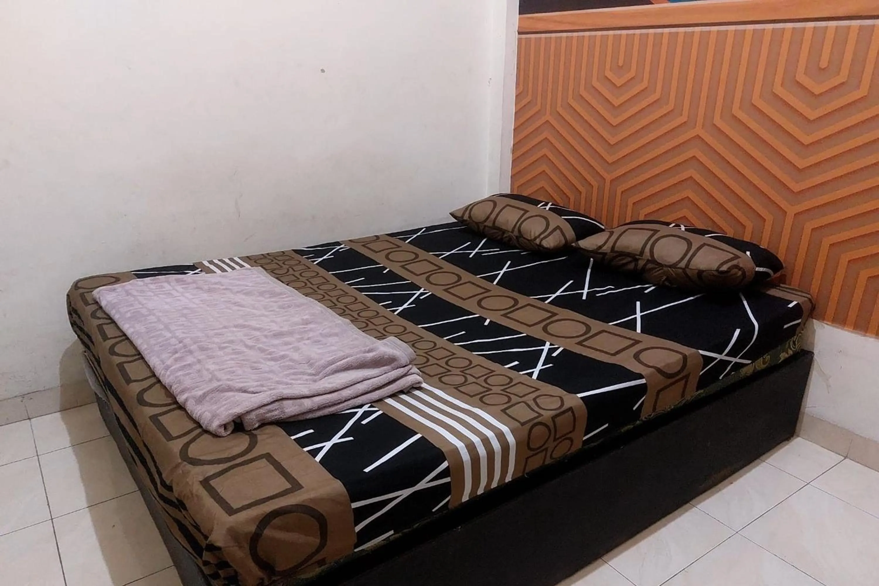 Bed in Guest House Idola Palopo