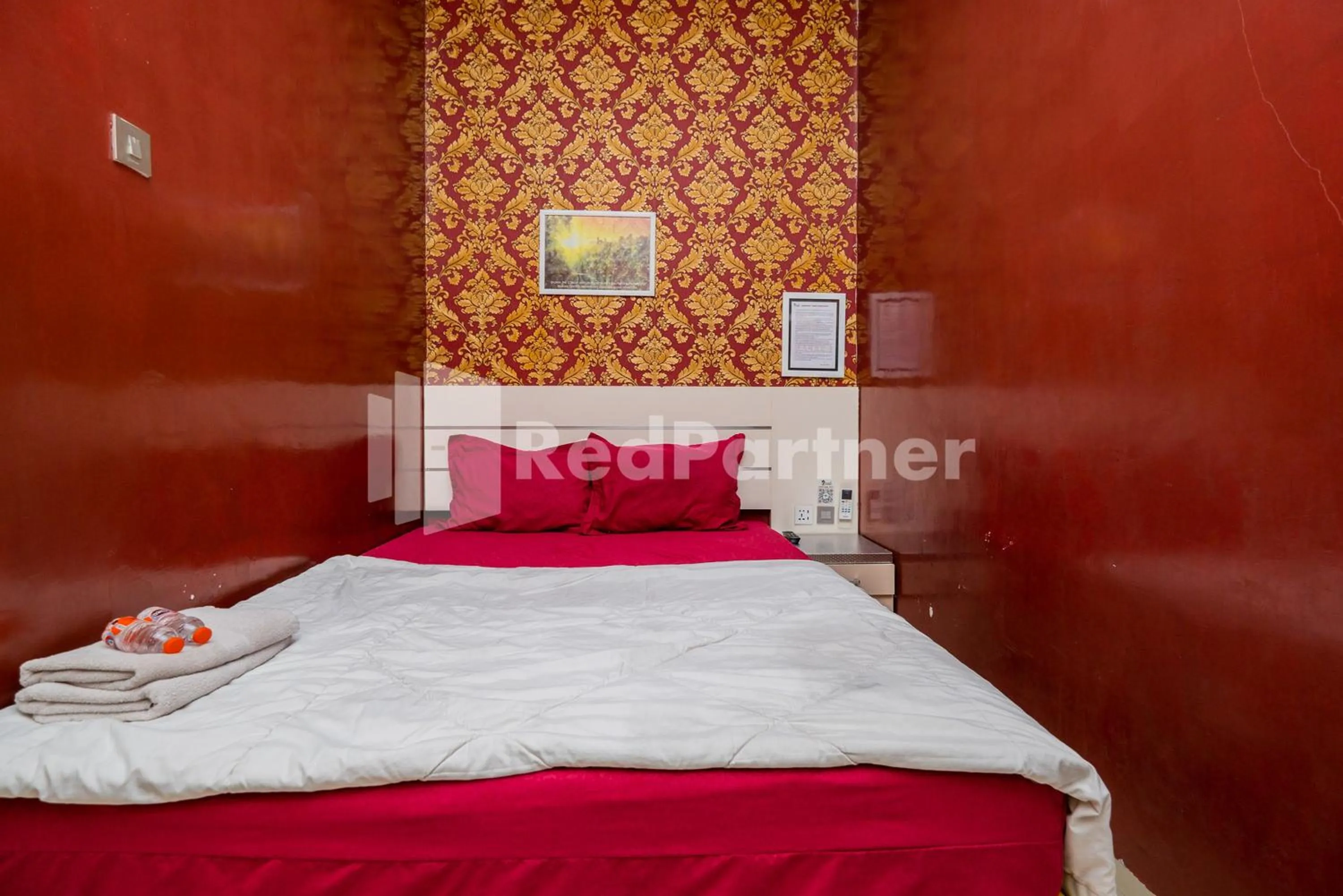 Bed in Omah Kalimosodo Mitra RedDoorz near Stasiun Malang Kota Baru