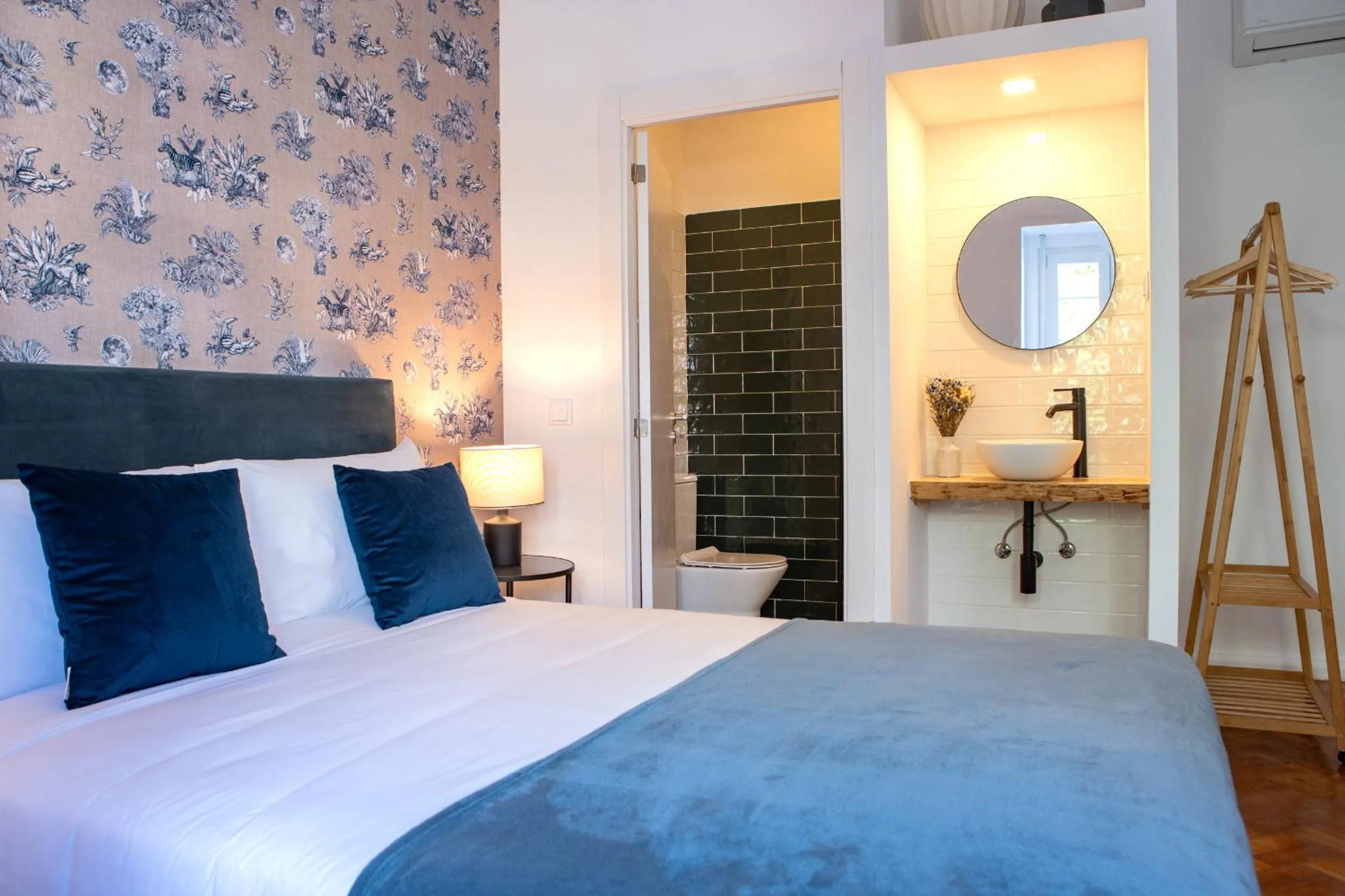 Bed in Succeed Campo Pequeno Suites