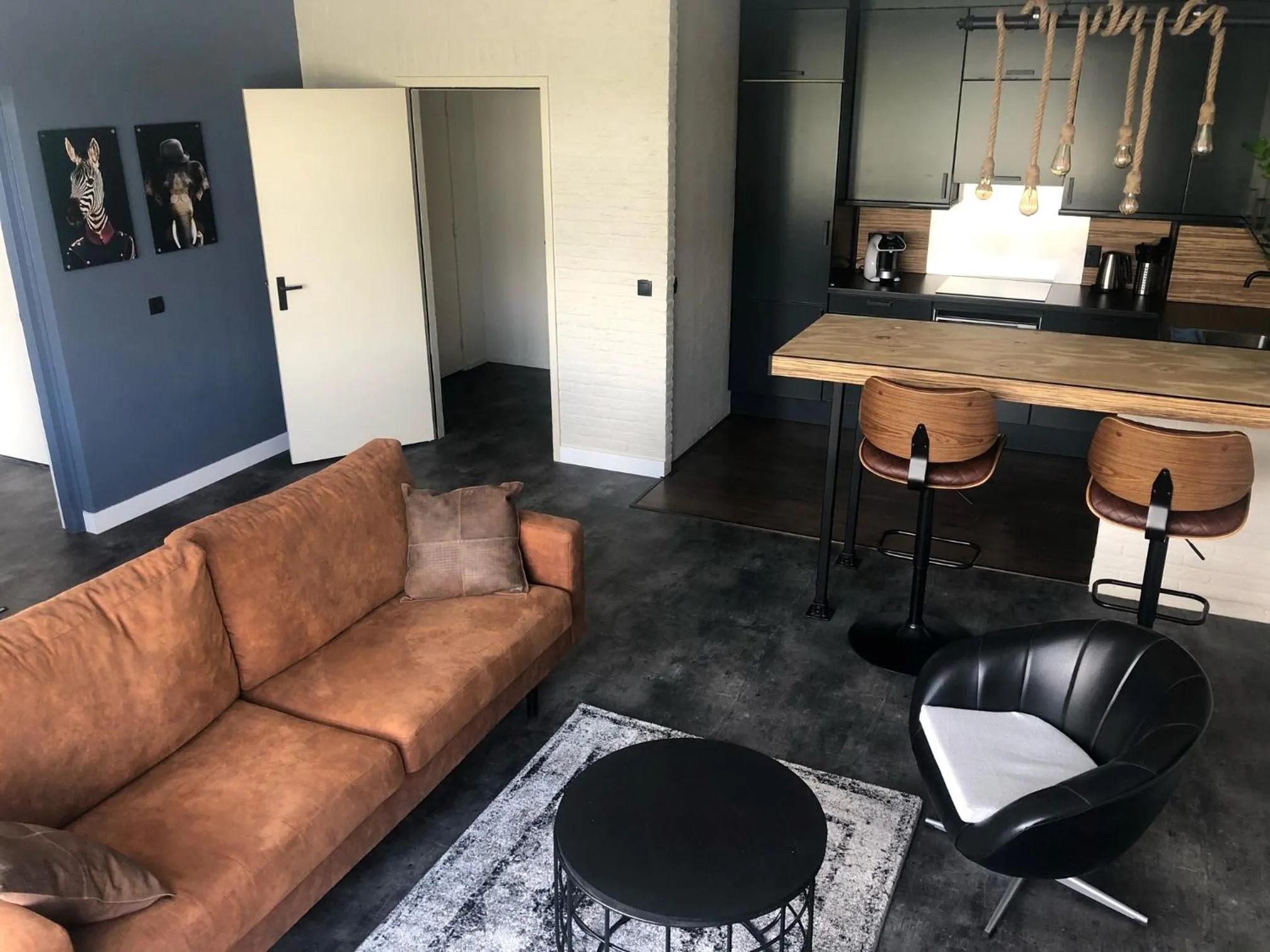 Living room in Fletcher Hotel-Restaurant De Reiskoffer