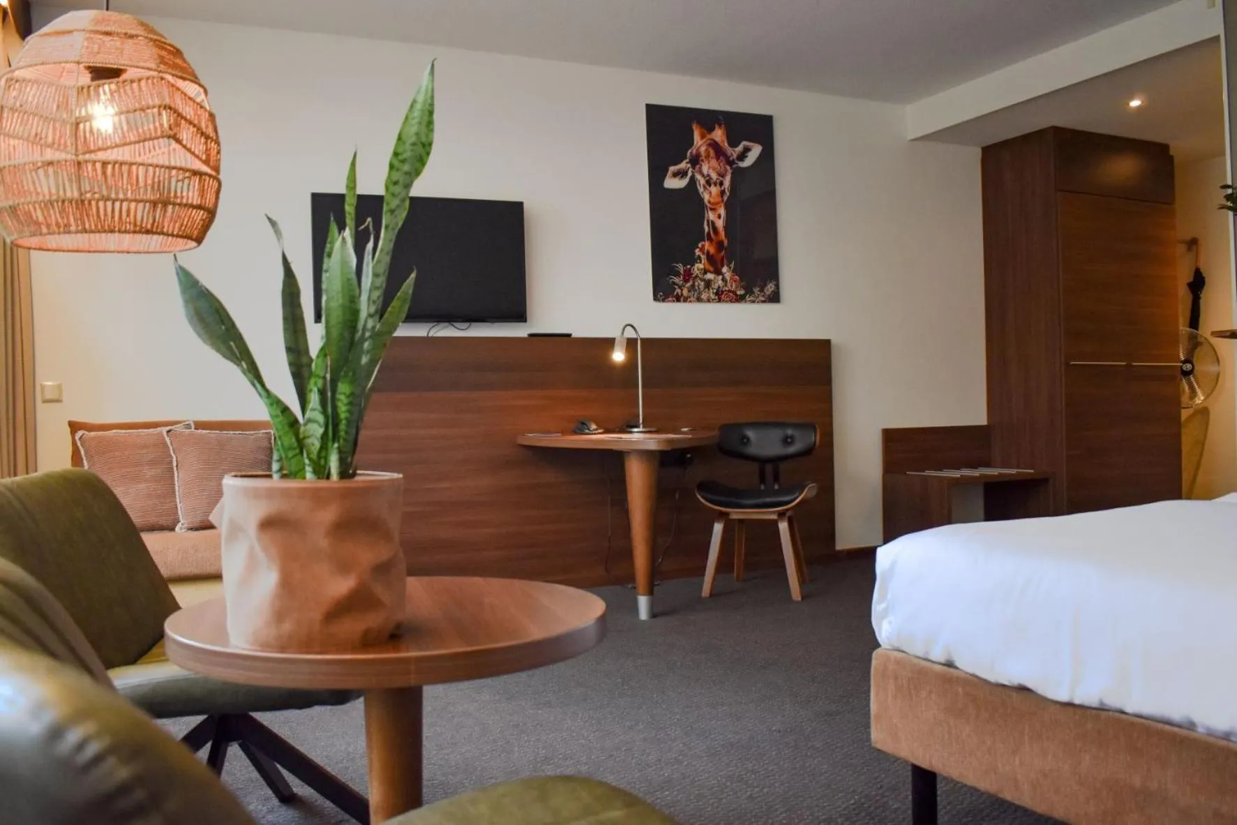 Seating area, Bed in Fletcher Hotel-Restaurant De Reiskoffer