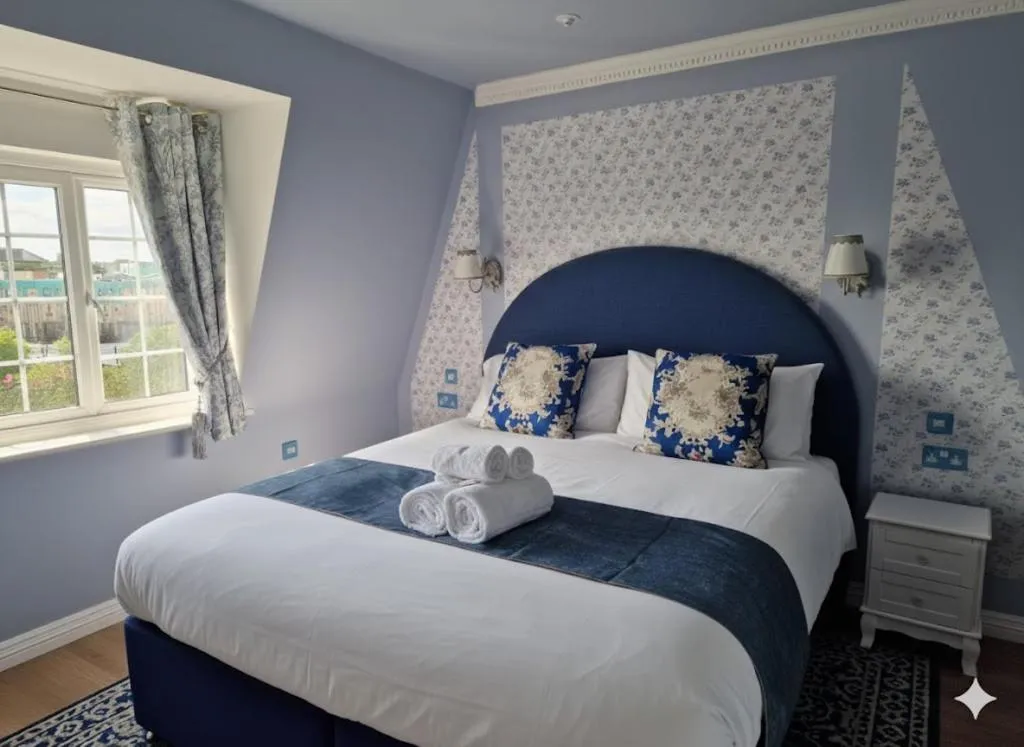 Bed in The Mad Hatter's Guestrooms