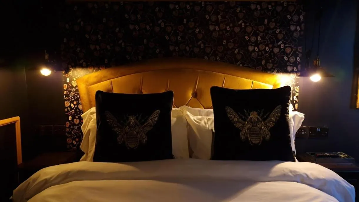 Bed in The Mad Hatter's Guestrooms