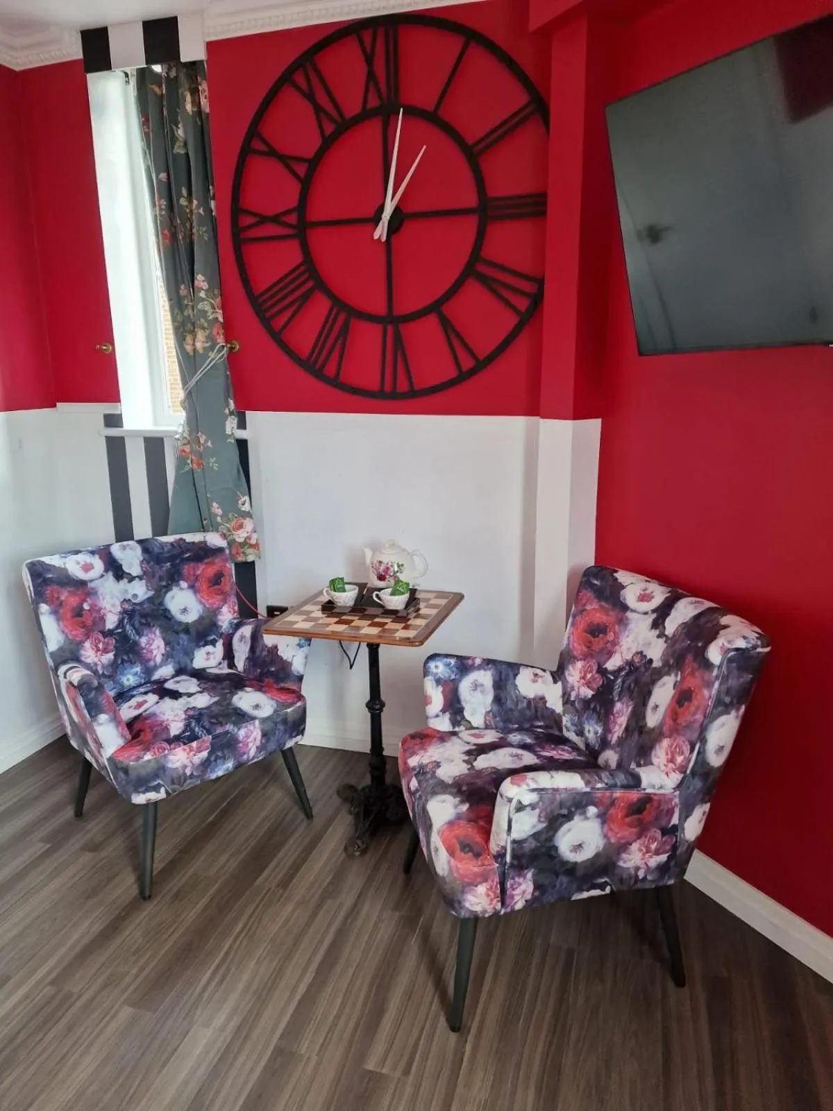 Seating area in The Mad Hatter's Guestrooms