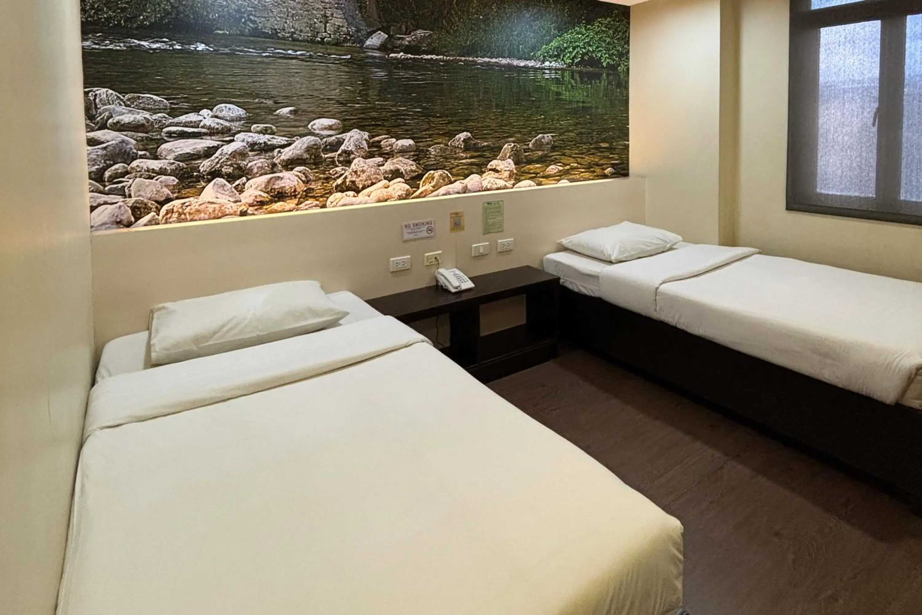 Bed in Sugbutel Family Hotel Cebu powered by Cocotel