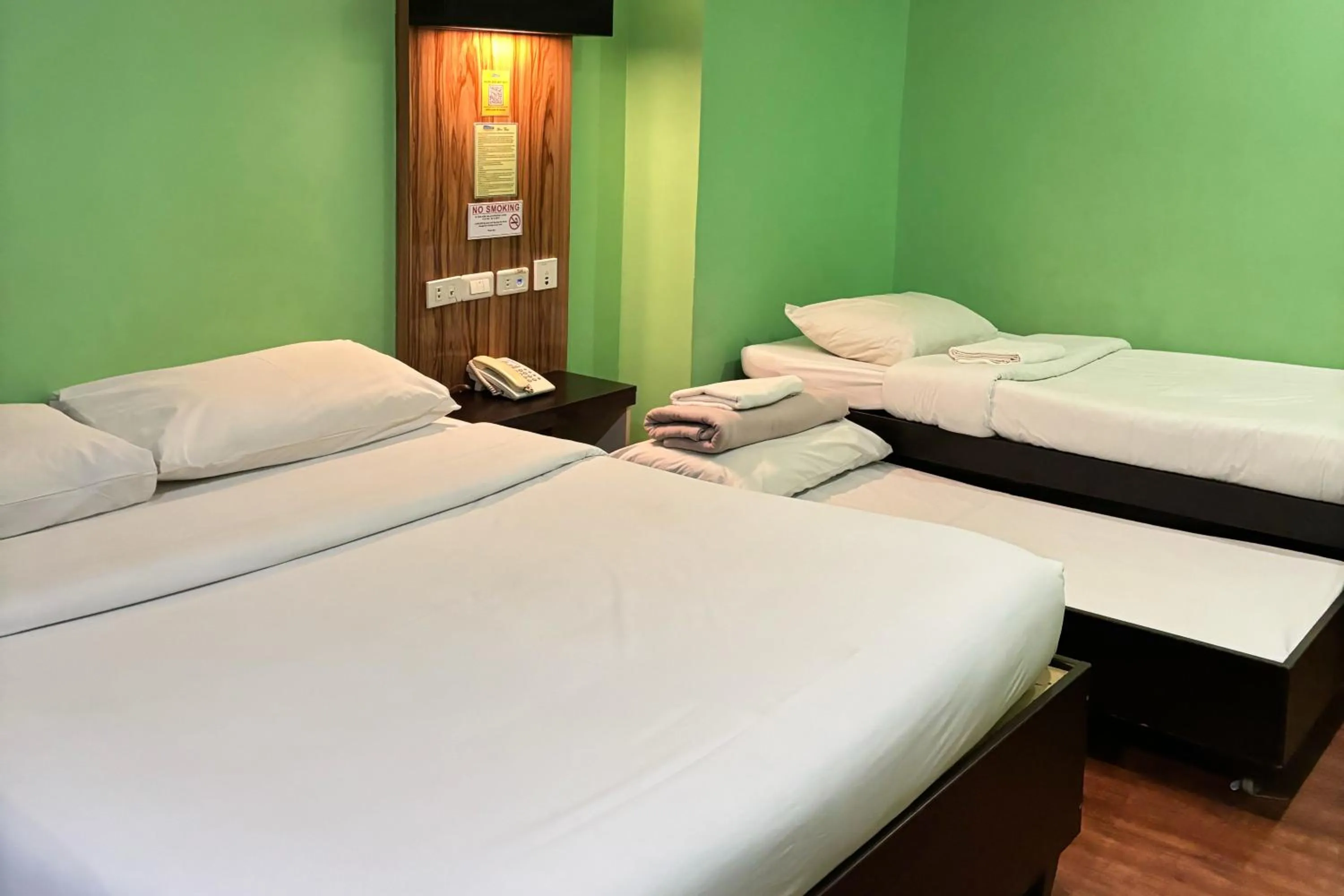 Bed in Sugbutel Family Hotel Cebu powered by Cocotel