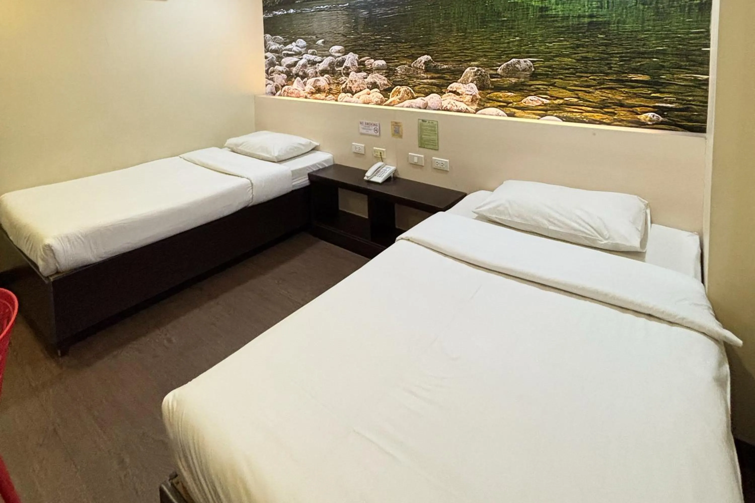 Bed in Sugbutel Family Hotel Cebu powered by Cocotel