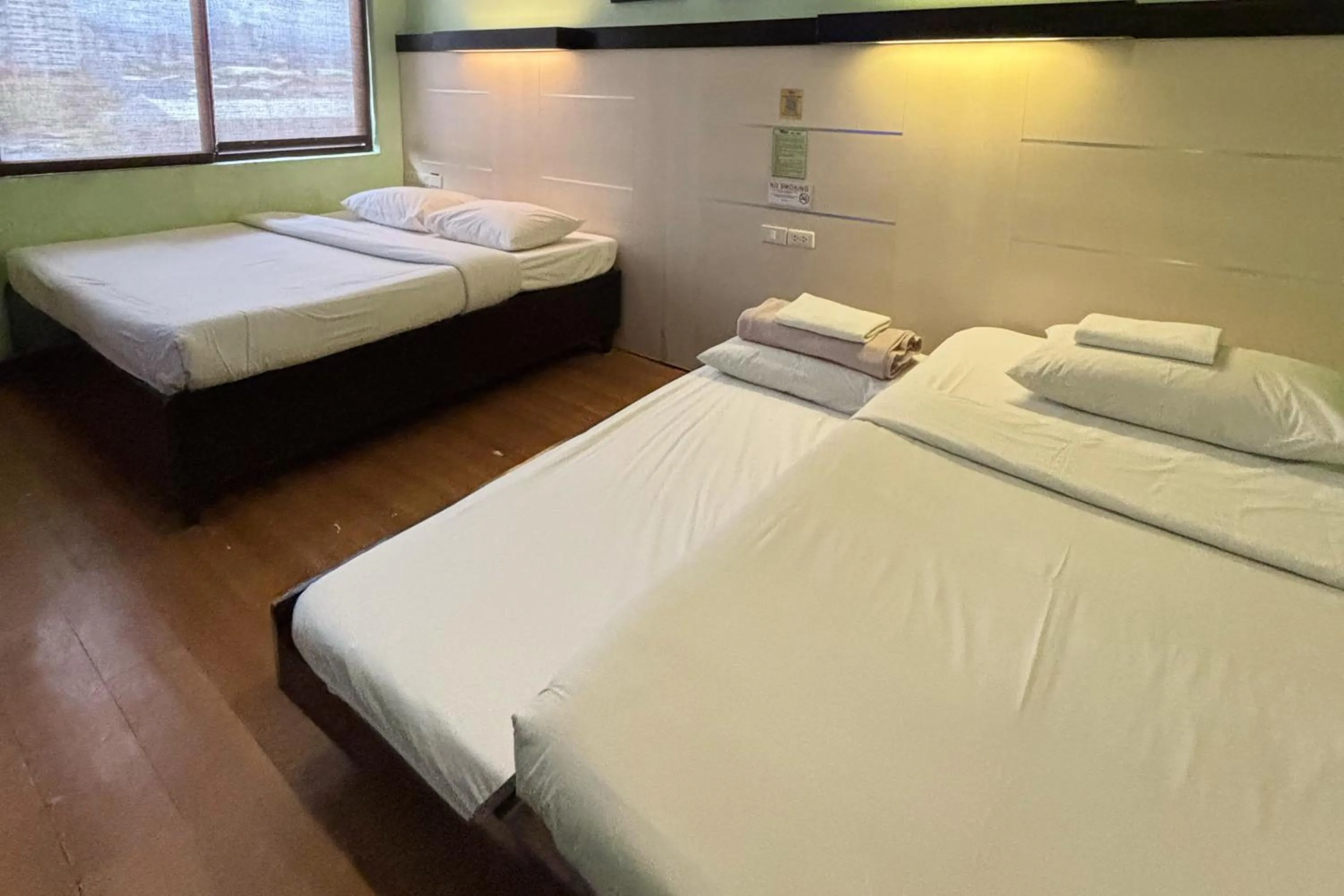 Bed in Sugbutel Family Hotel Cebu powered by Cocotel