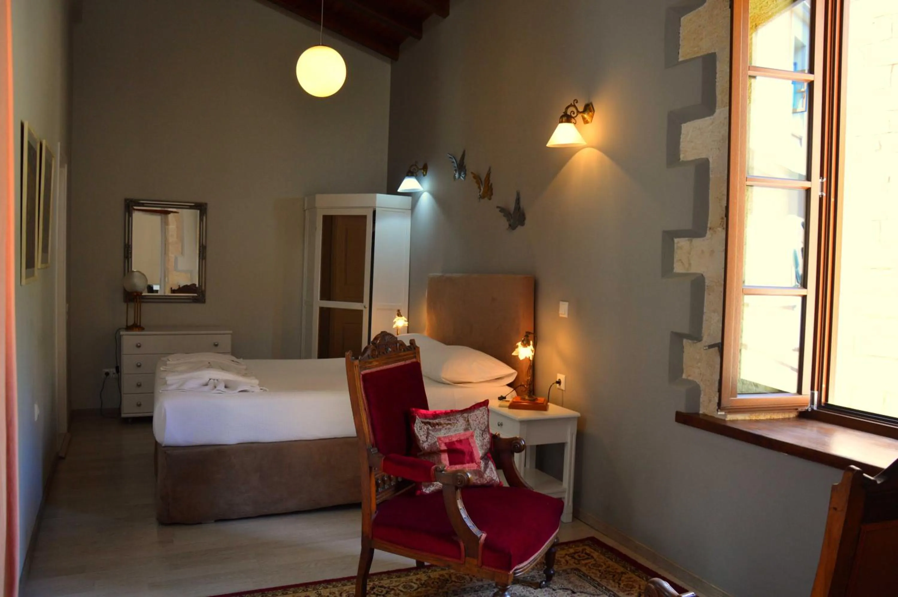 Bed in Erietta Suites