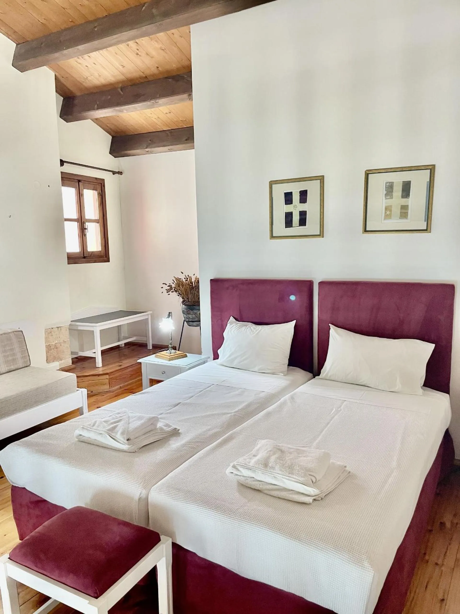 Bed in Erietta Suites