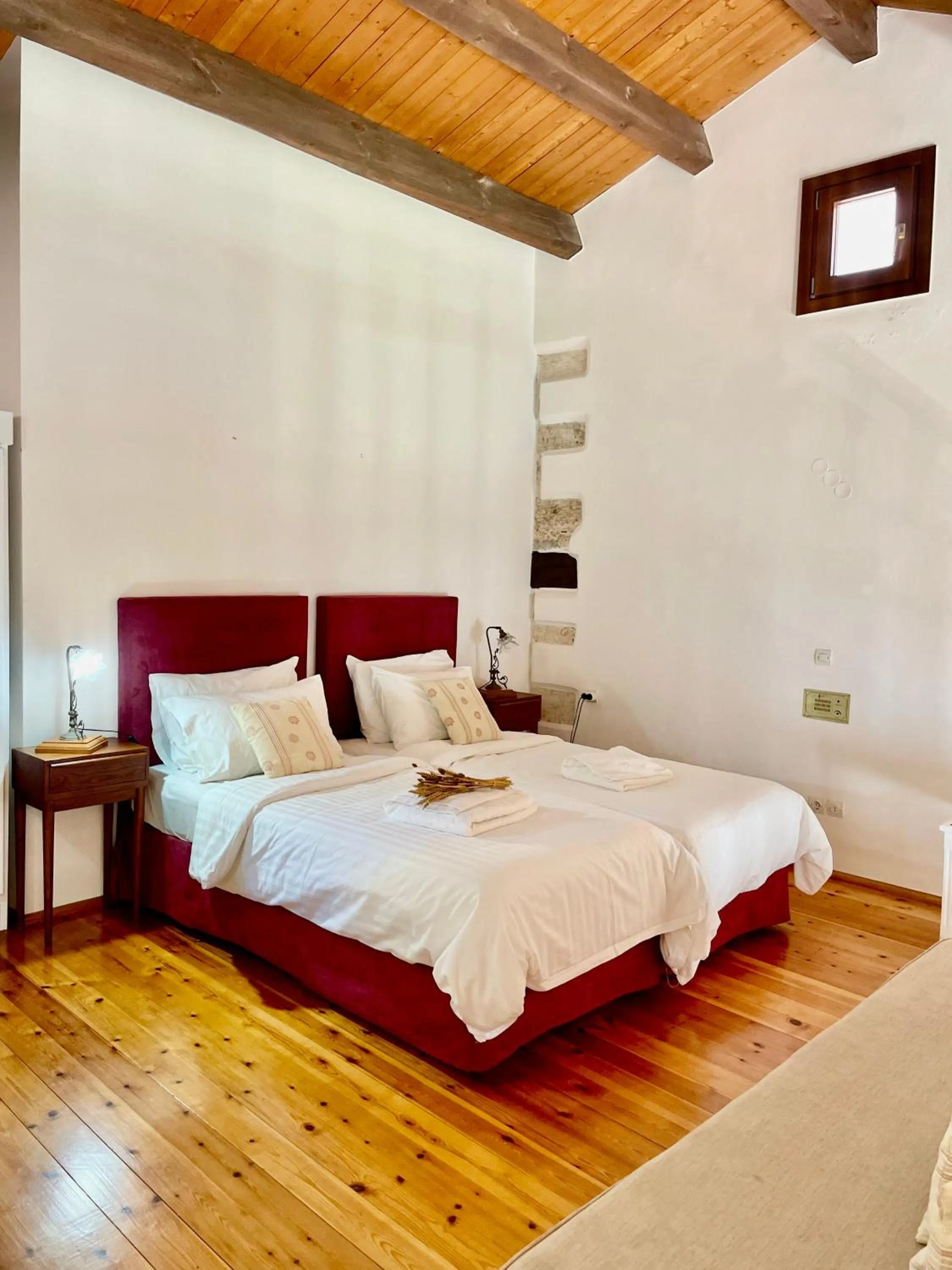 Bed in Erietta Suites