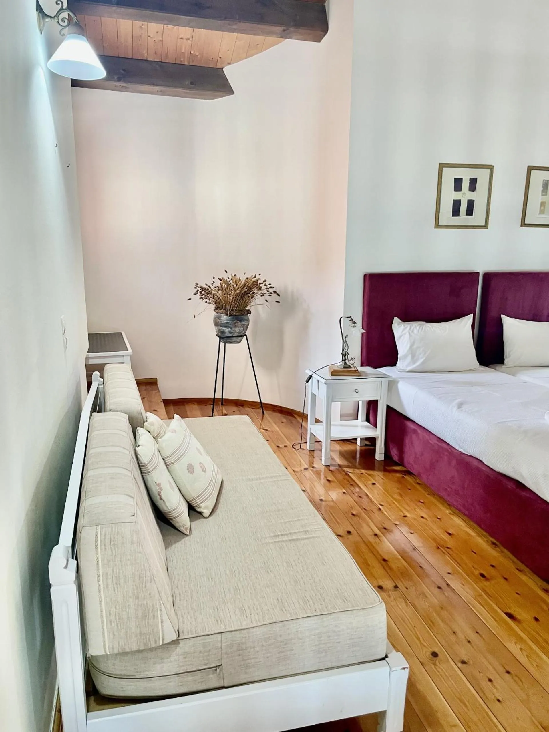 Bed in Erietta Suites