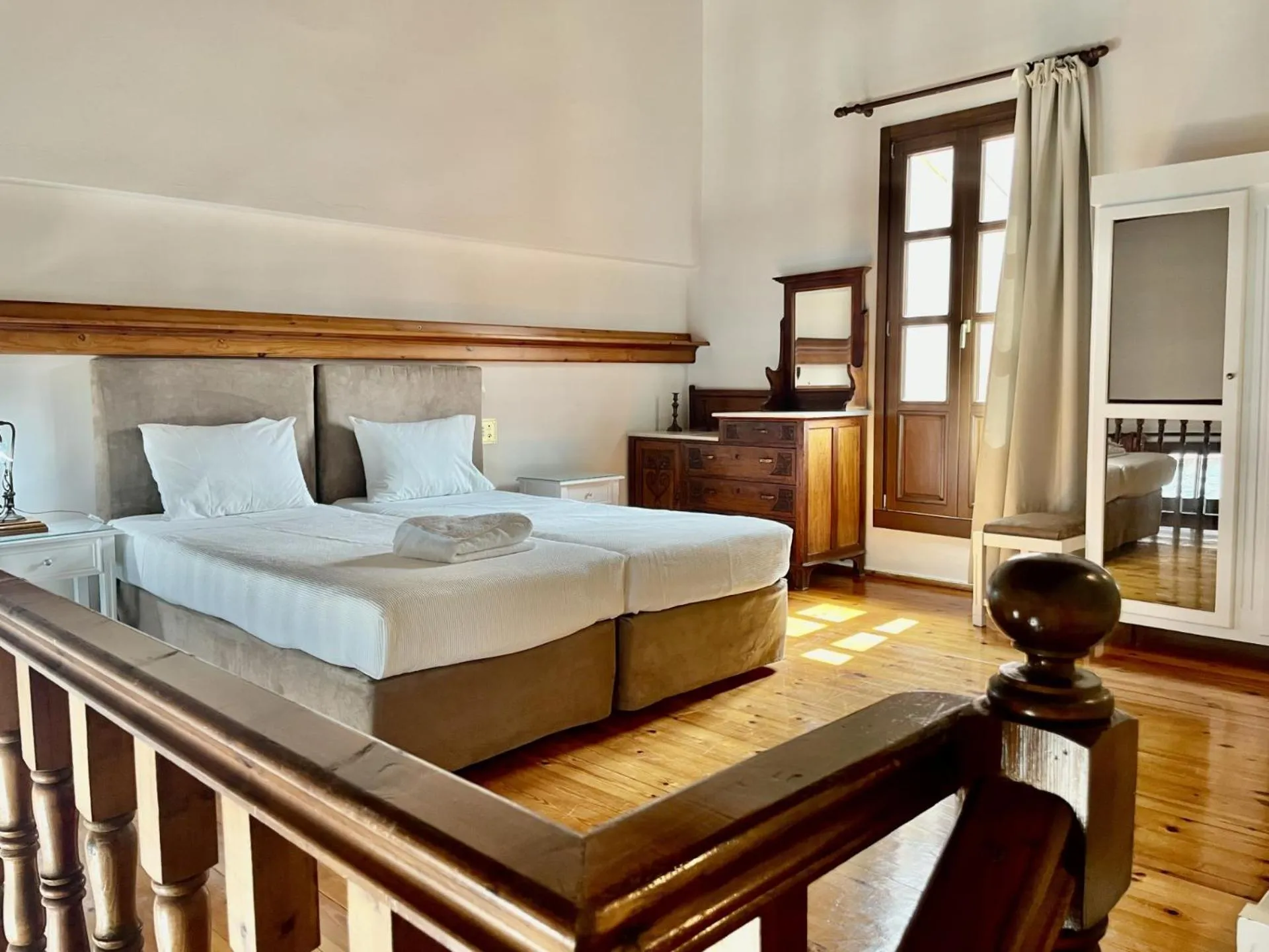Bed in Erietta Suites