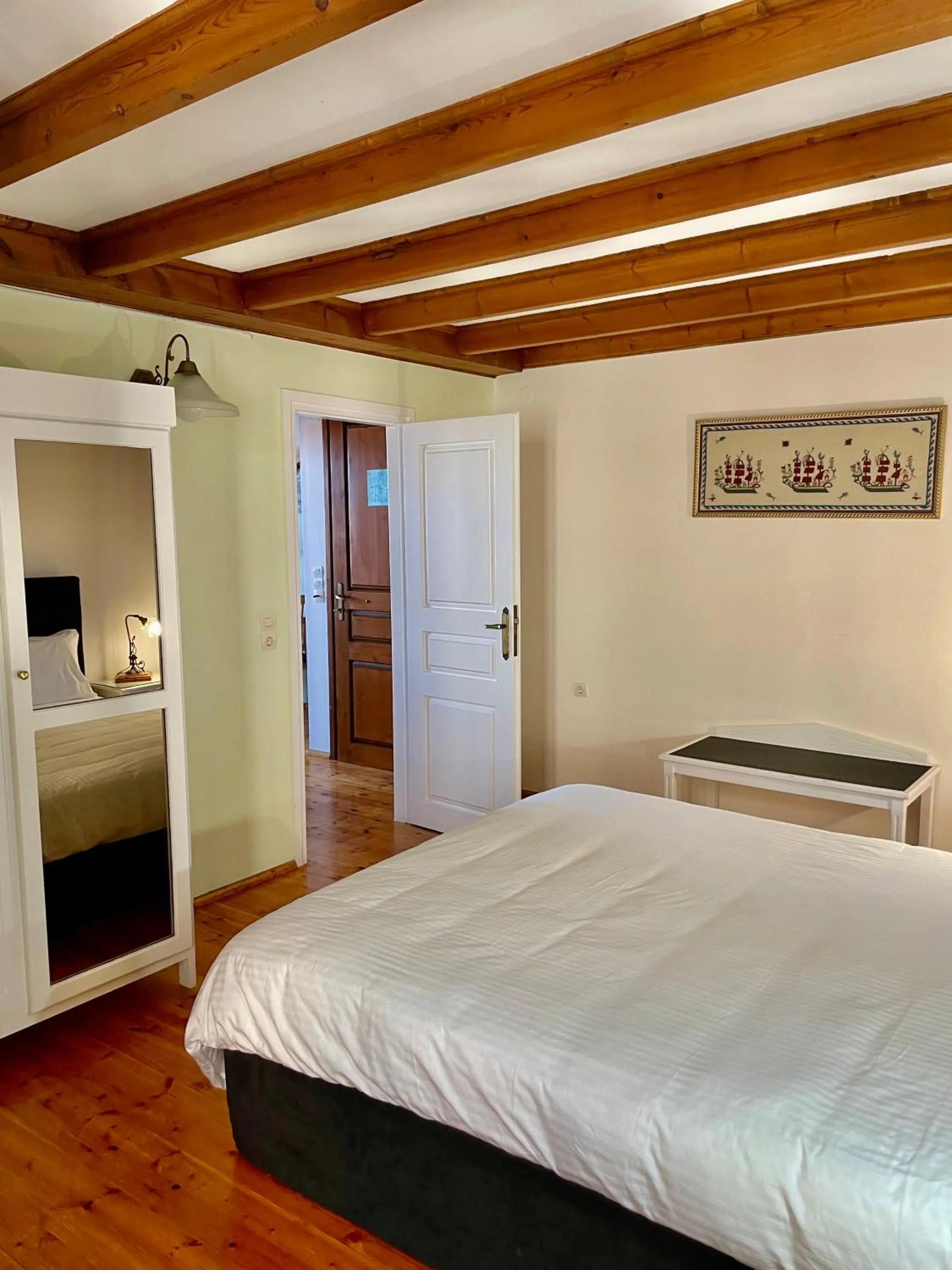 Bed in Erietta Suites