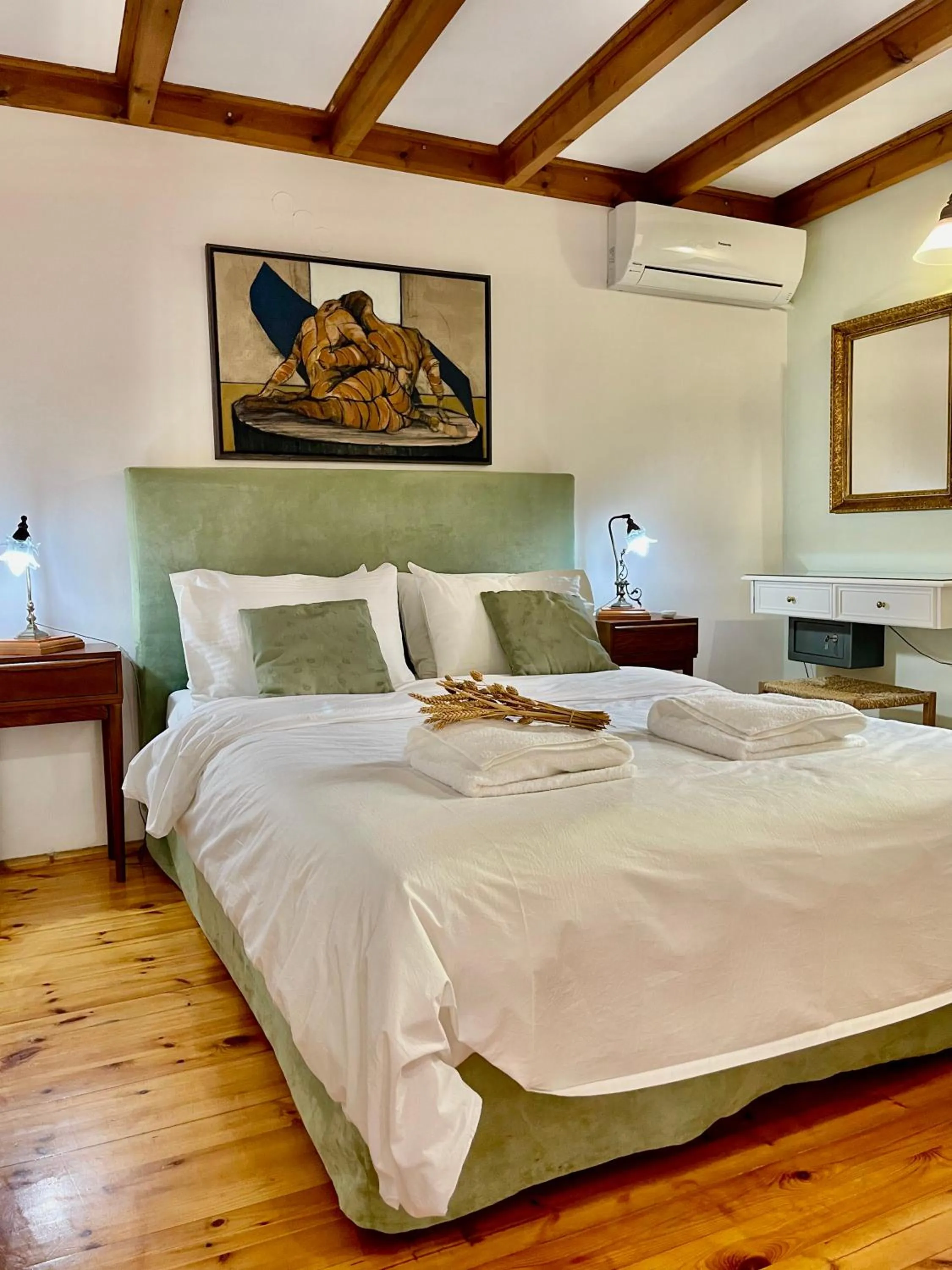 Bed in Erietta Suites