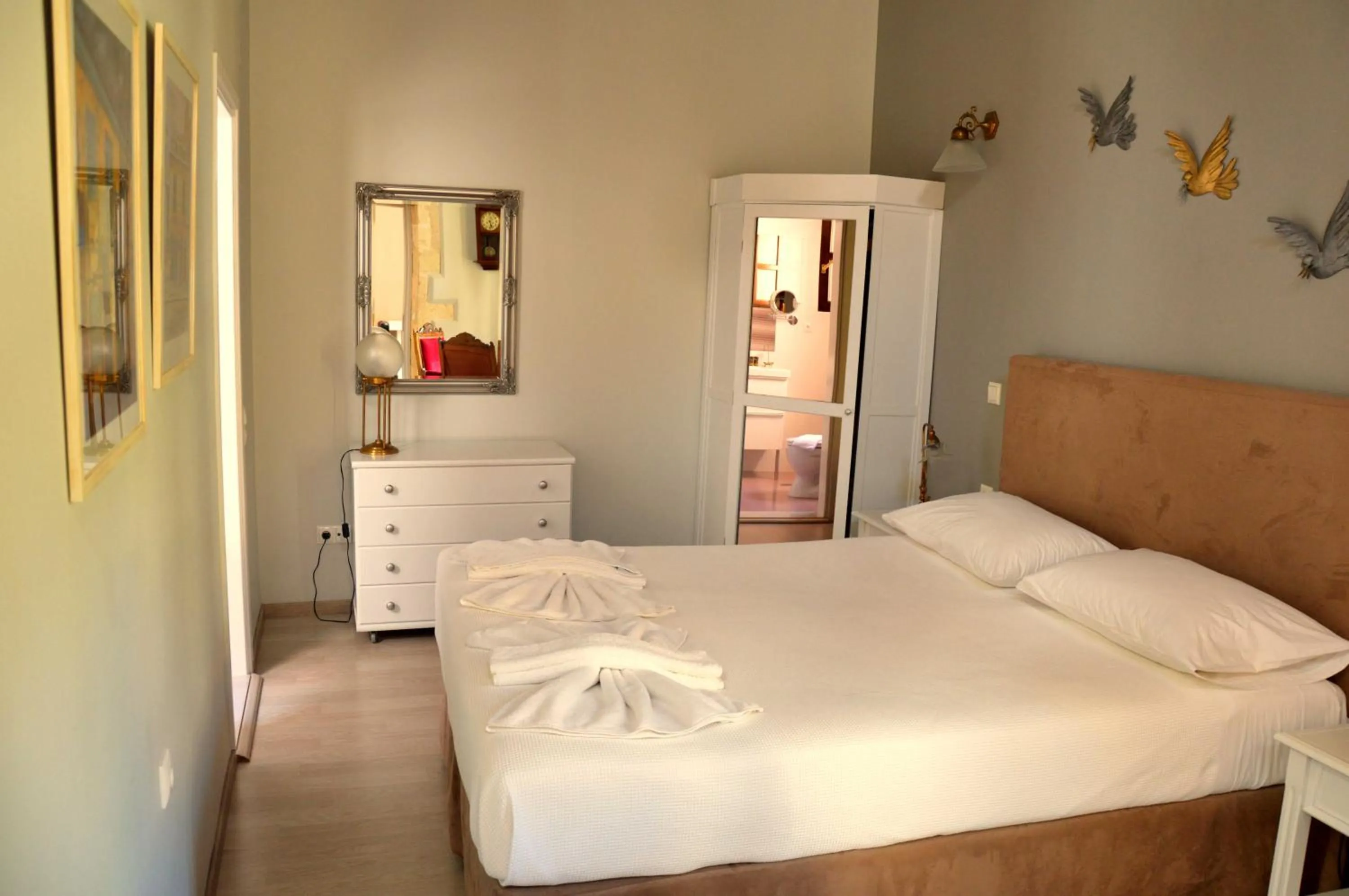 Bed in Erietta Suites