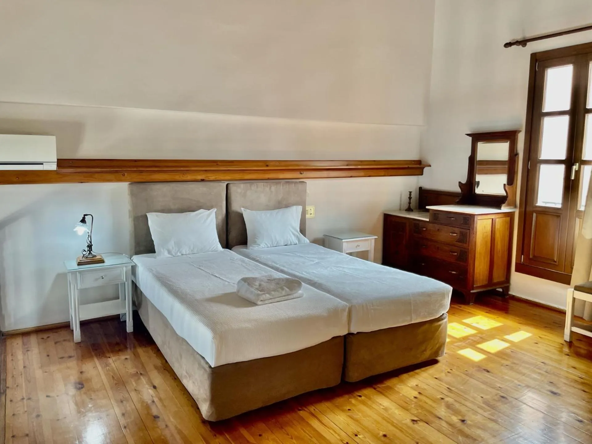 Bed in Erietta Suites
