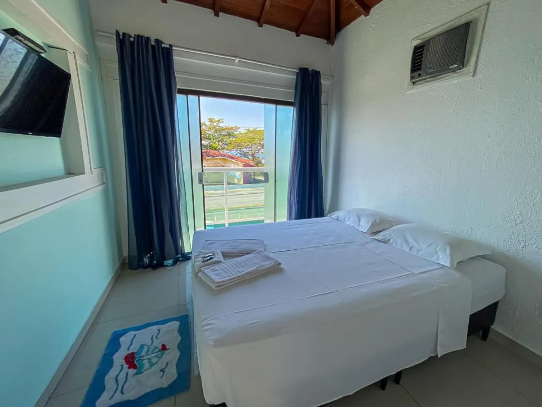 Bed in Pousada Riviera Caragua