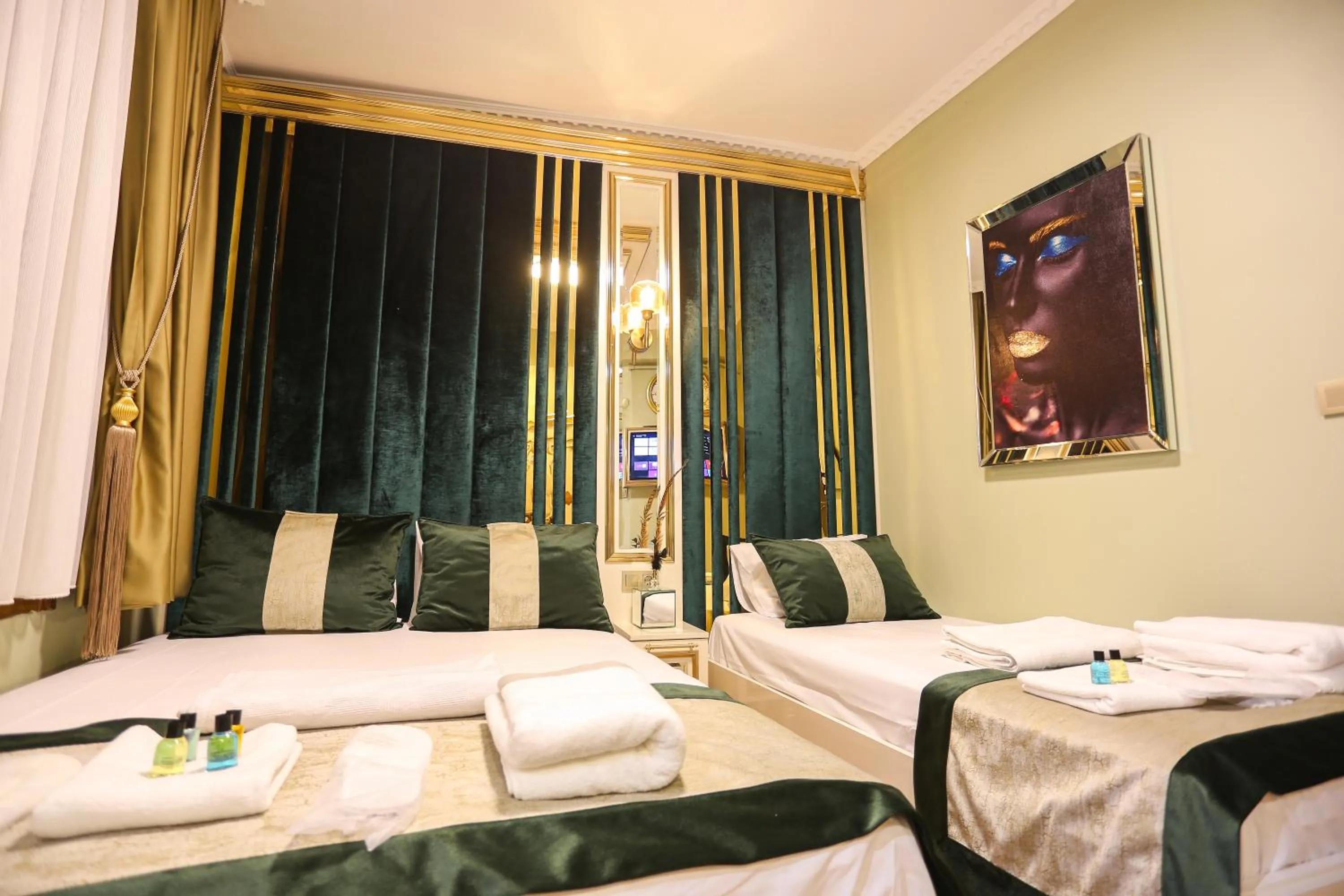 Bed in Whıte Moon Hotel Suites