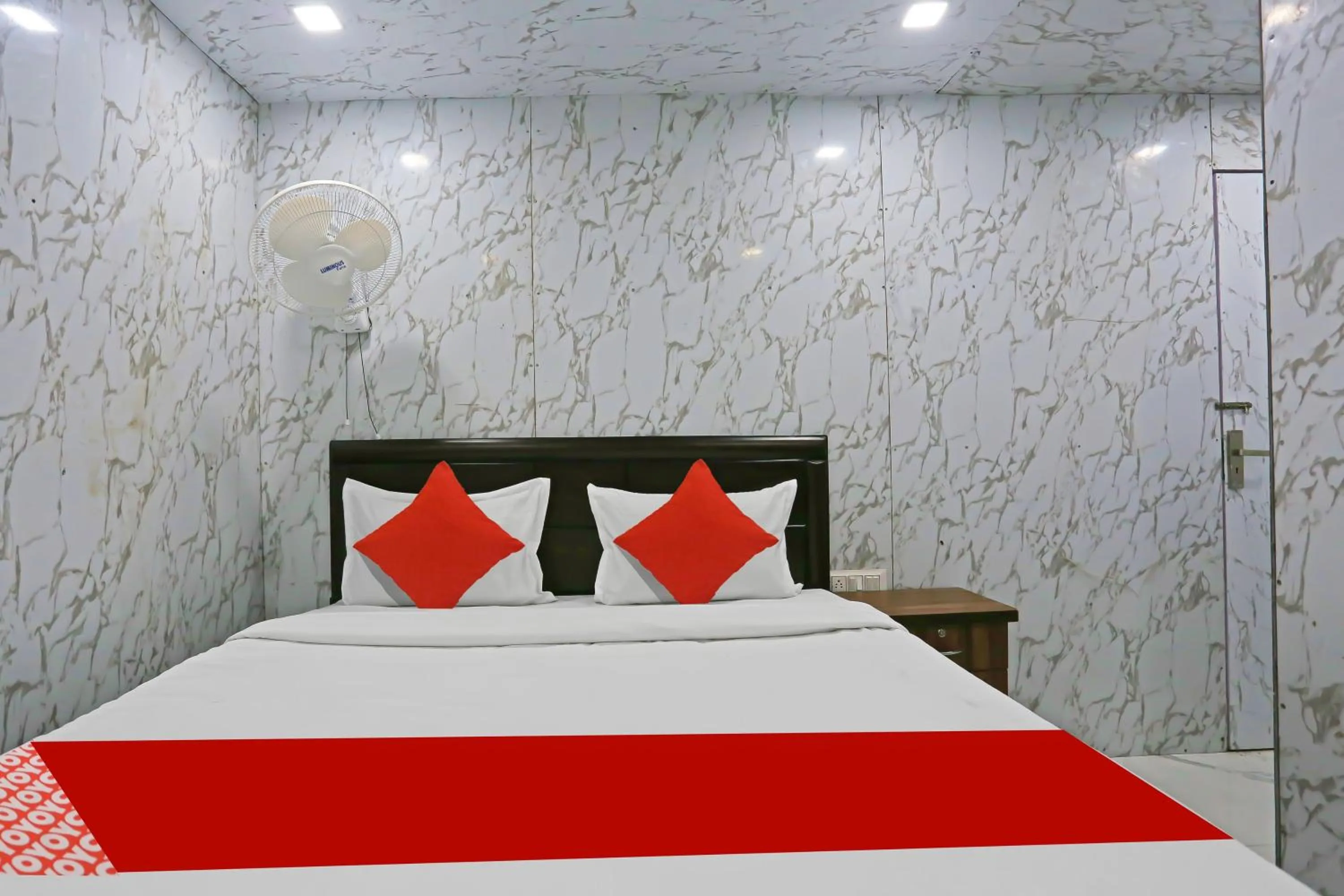 Bedroom in Hotel O Happy Hours