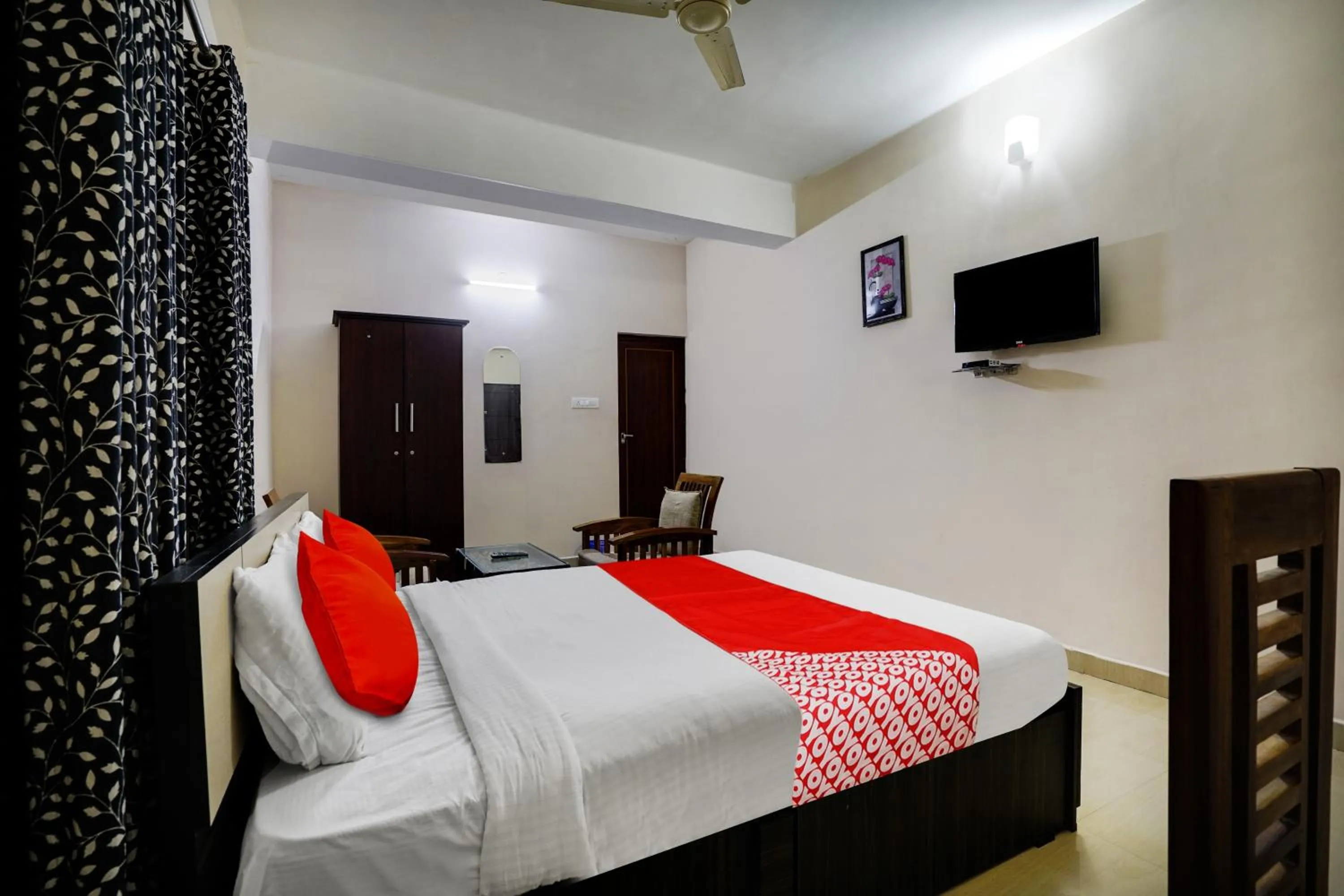 Bedroom in OYO Flagship Arrows Tourist Home