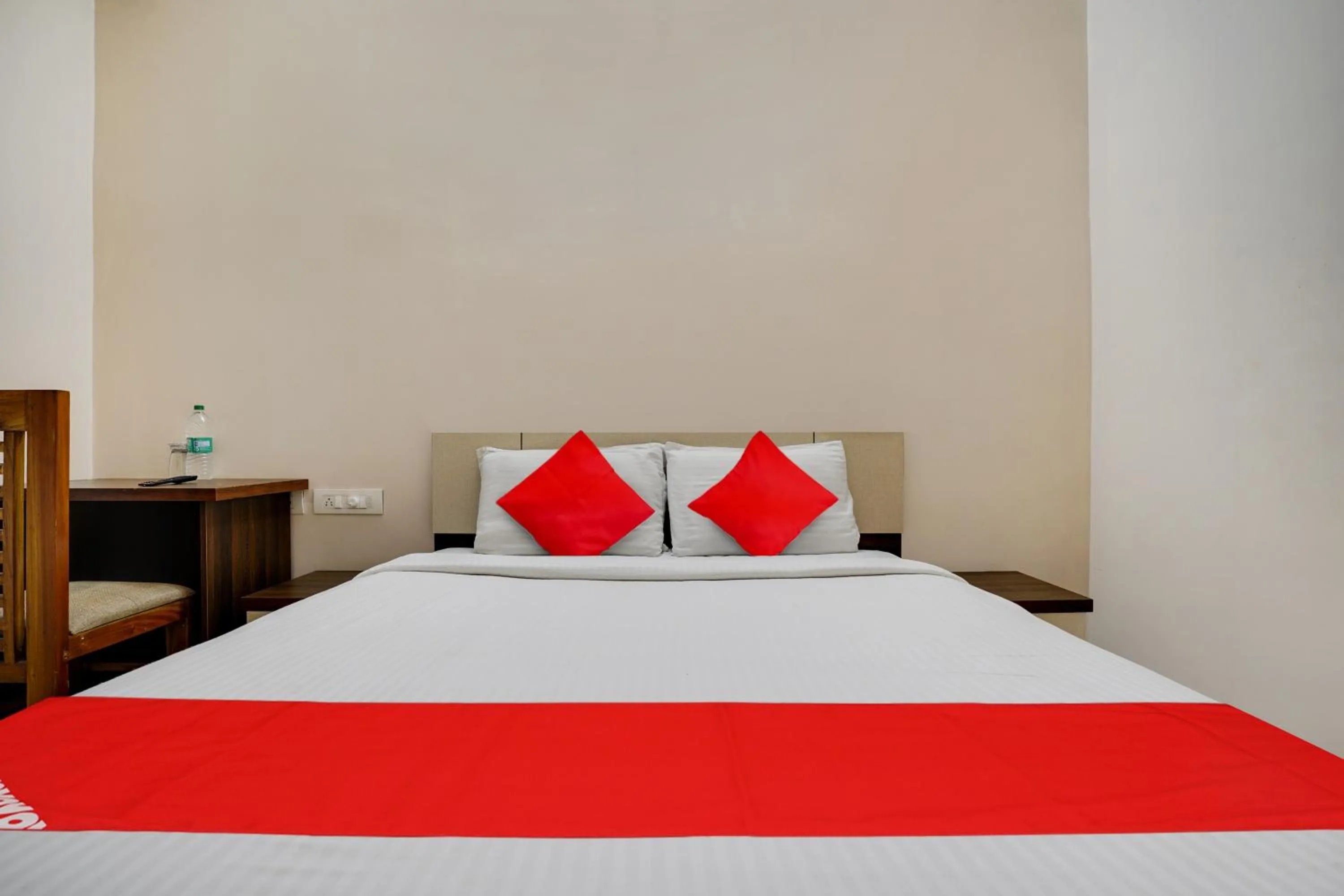 Bedroom in OYO Flagship Arrows Tourist Home