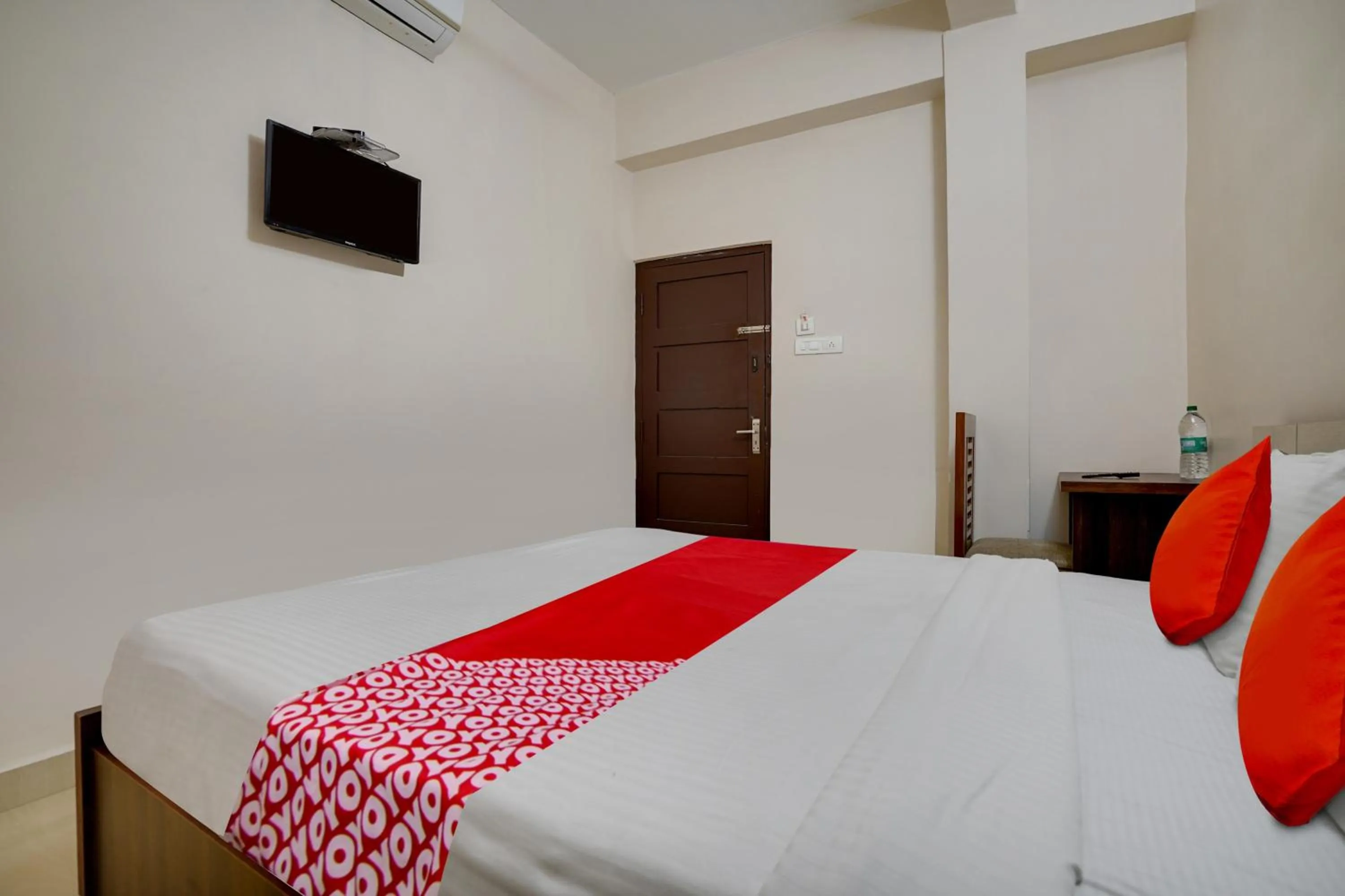 Bedroom in OYO Flagship Arrows Tourist Home