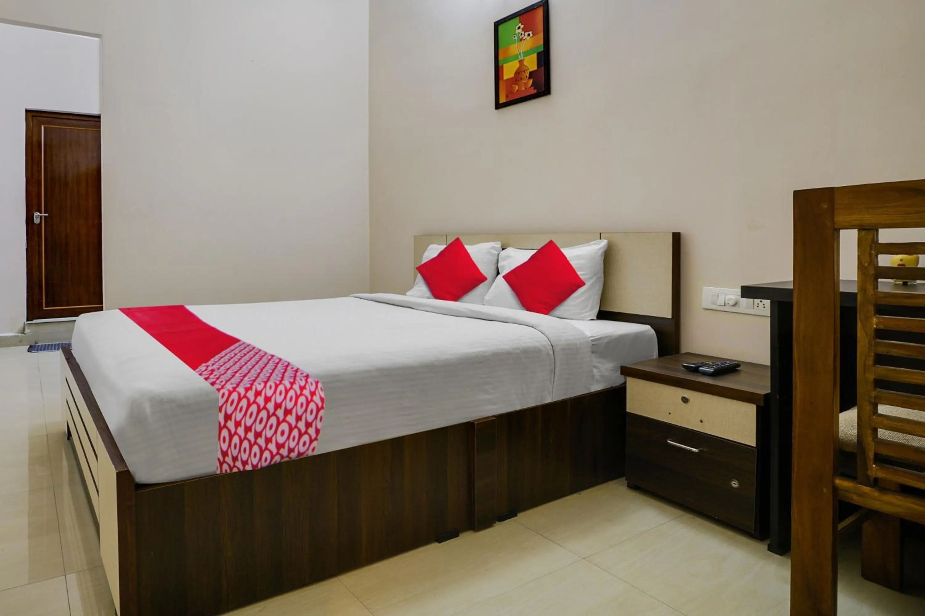Bedroom in OYO Flagship Arrows Tourist Home