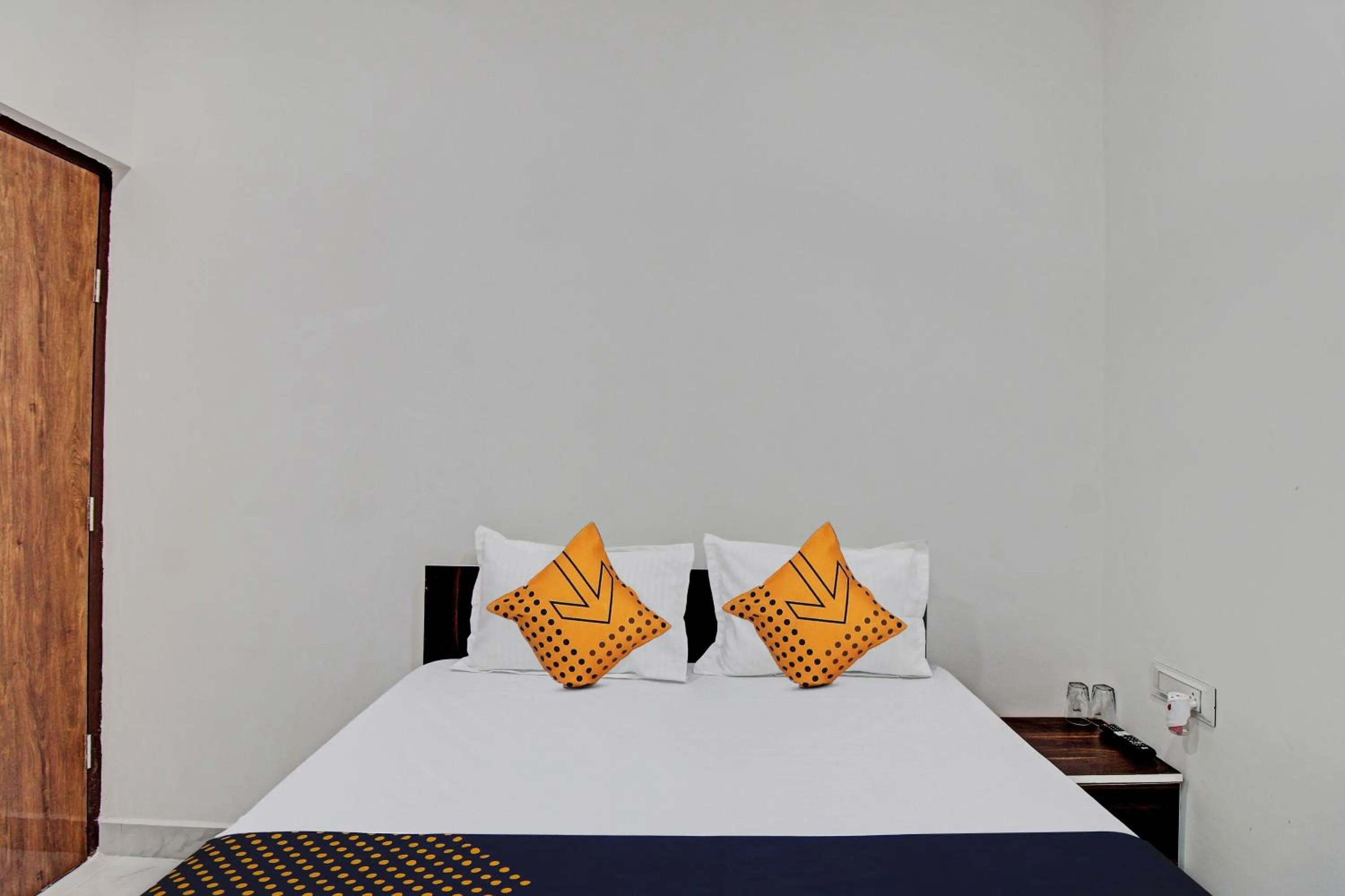 Bedroom in Spot On Tulsi Stay Inn