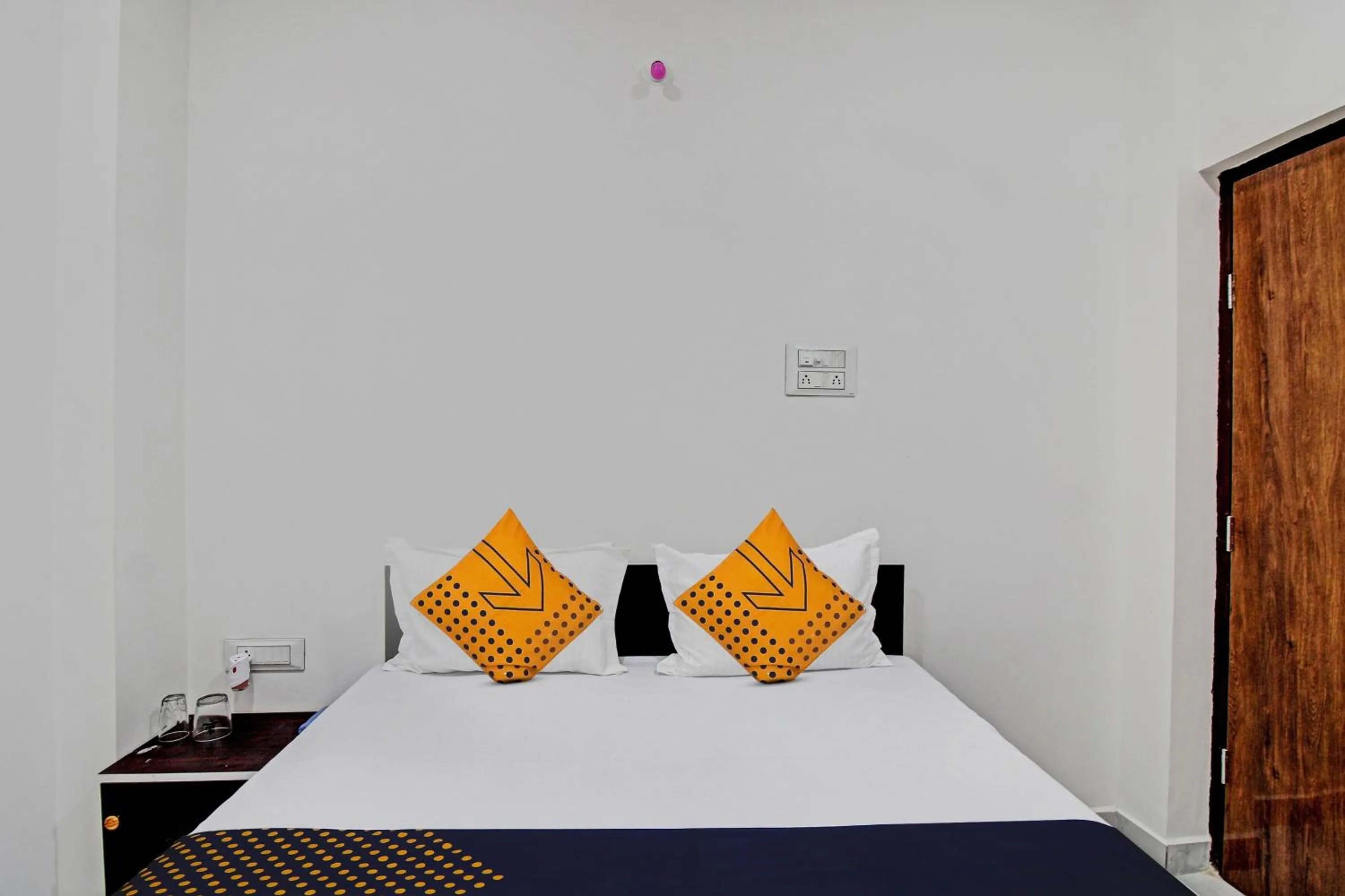 Bedroom, Bed in Spot On Tulsi Stay Inn