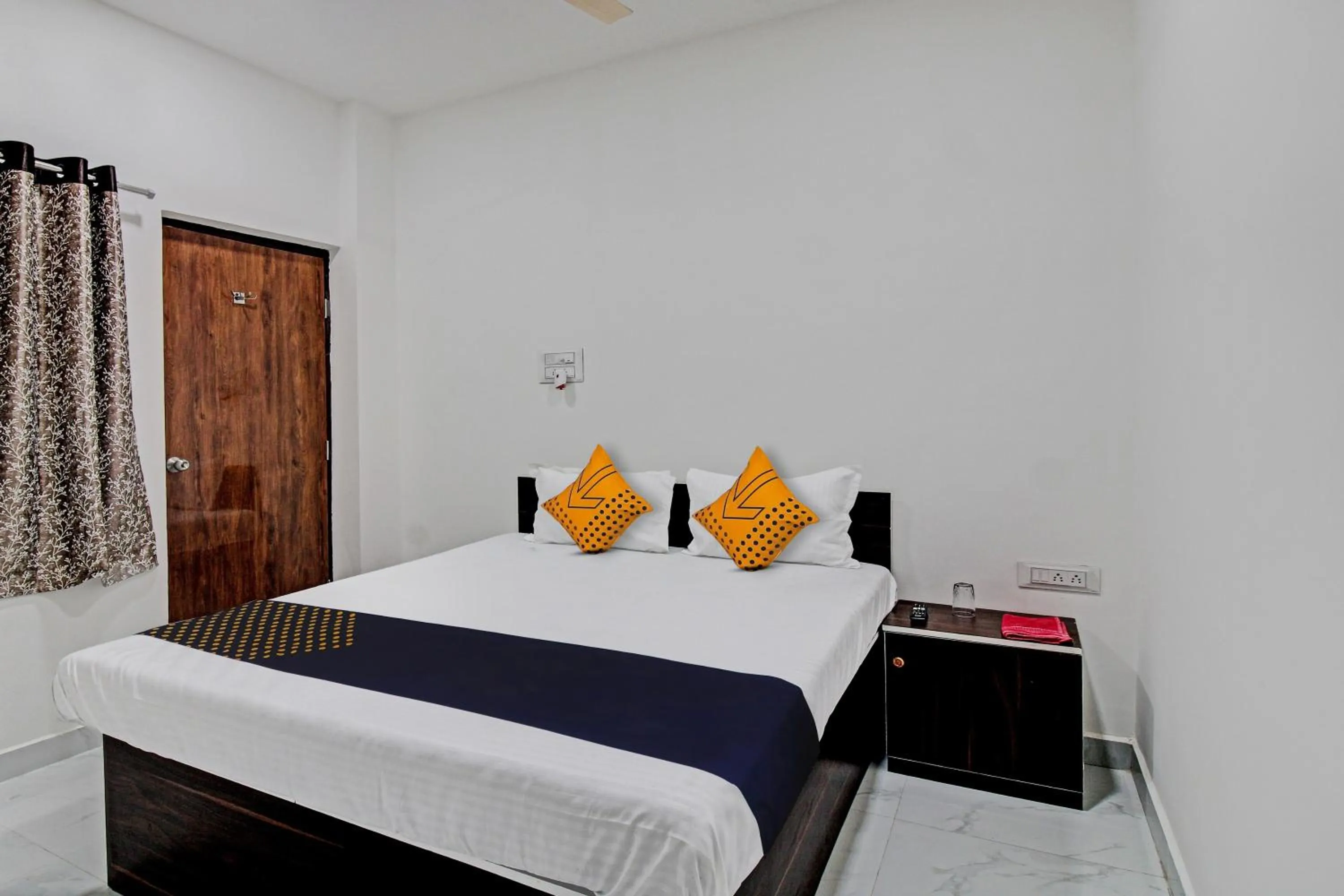 Bedroom, Bed in Spot On Tulsi Stay Inn