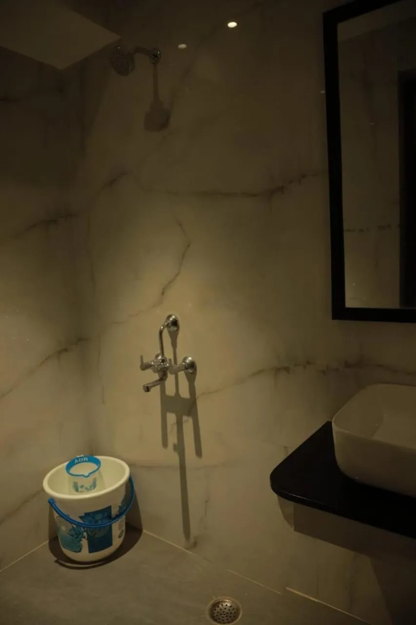 Bathroom in ARUNACHALA INN