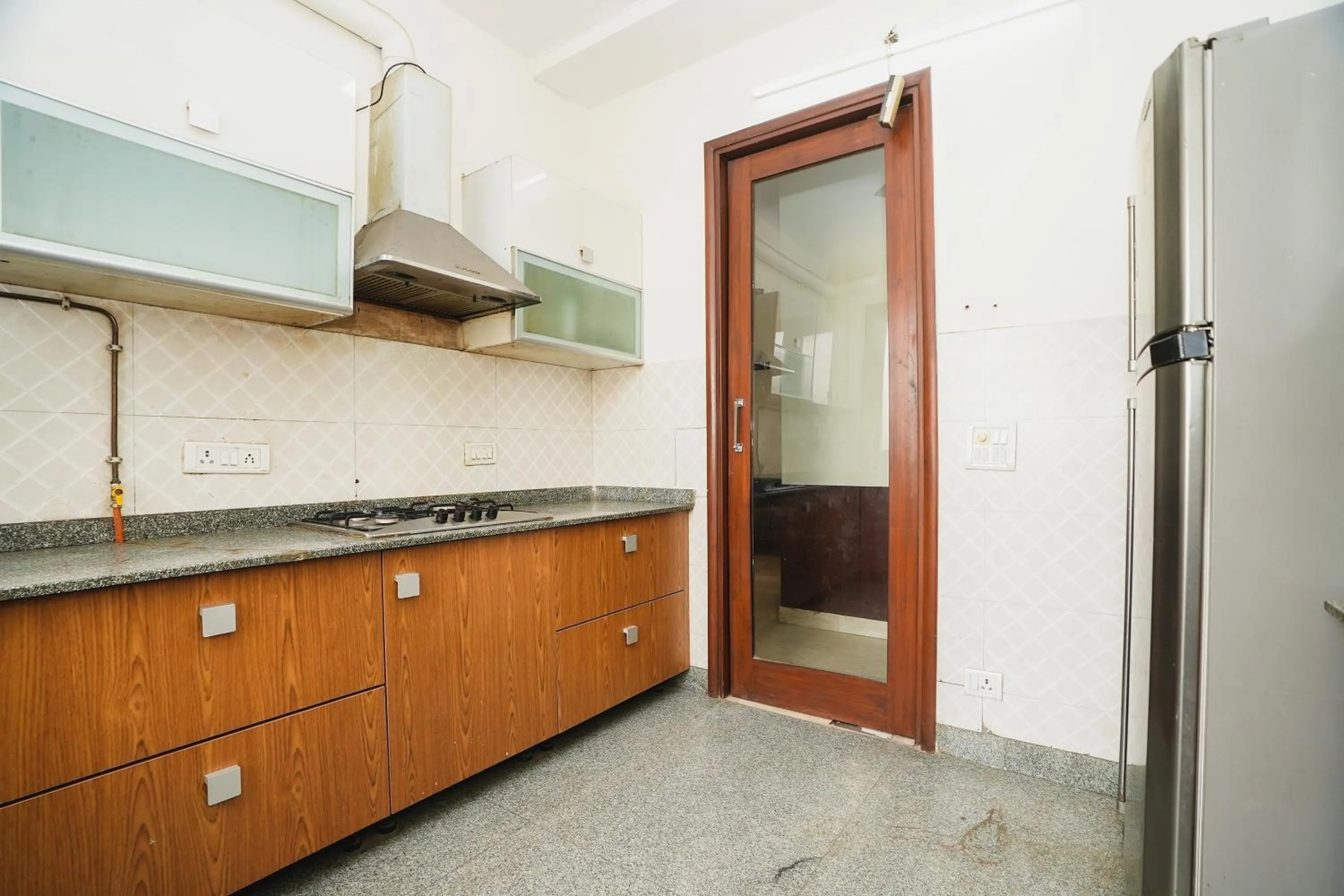 Kitchen or kitchenette in Mintstar Apartment and Suites, Chittaranjan Park