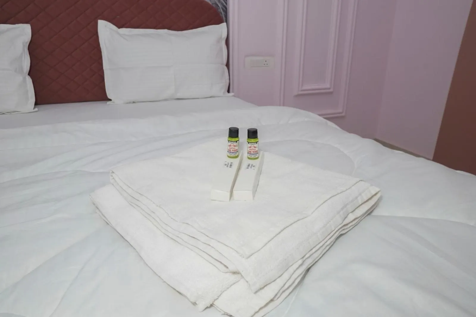 Bed in HOTEL LIME WOOD