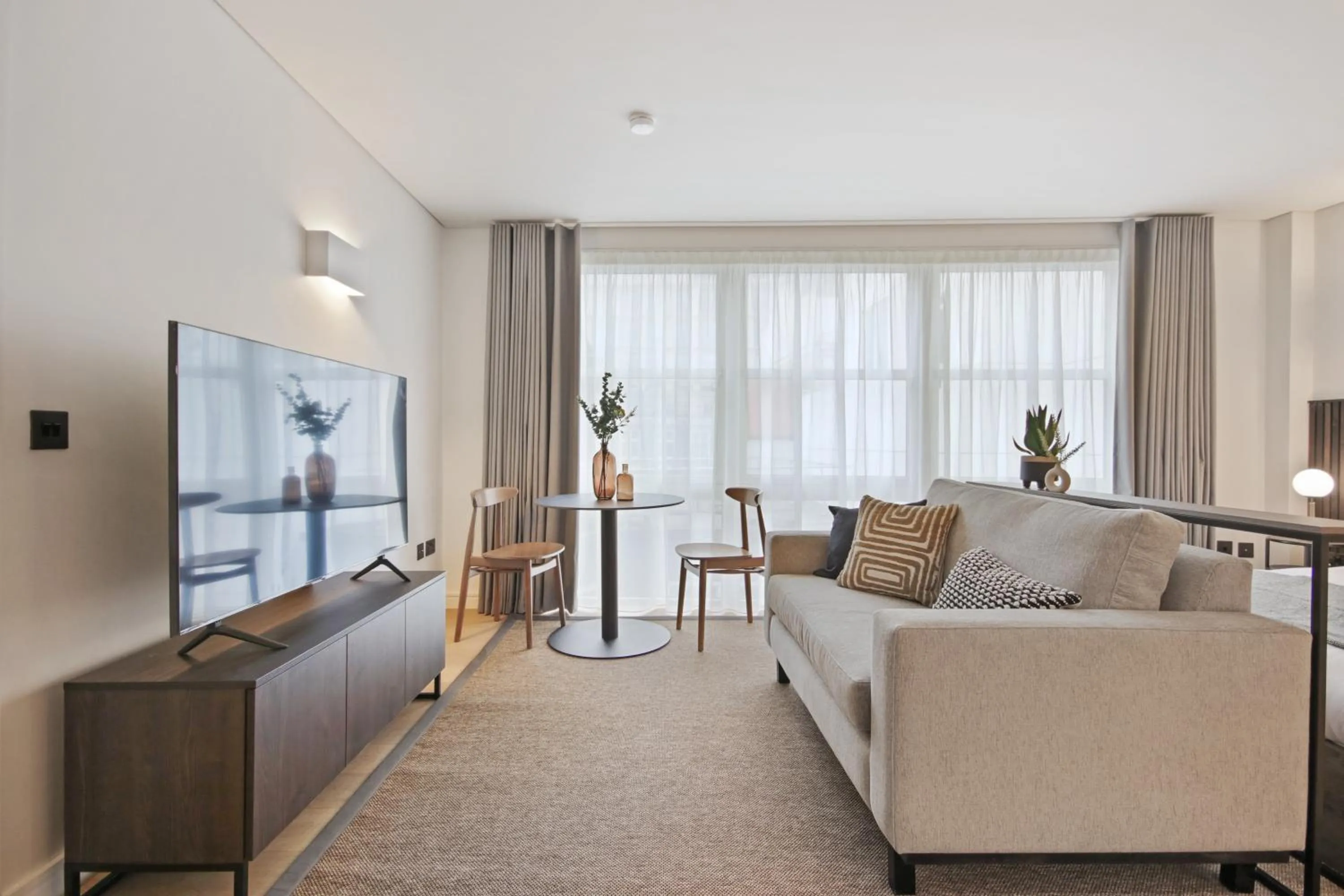 Seating area in Bow Lane by Aeria Apartments