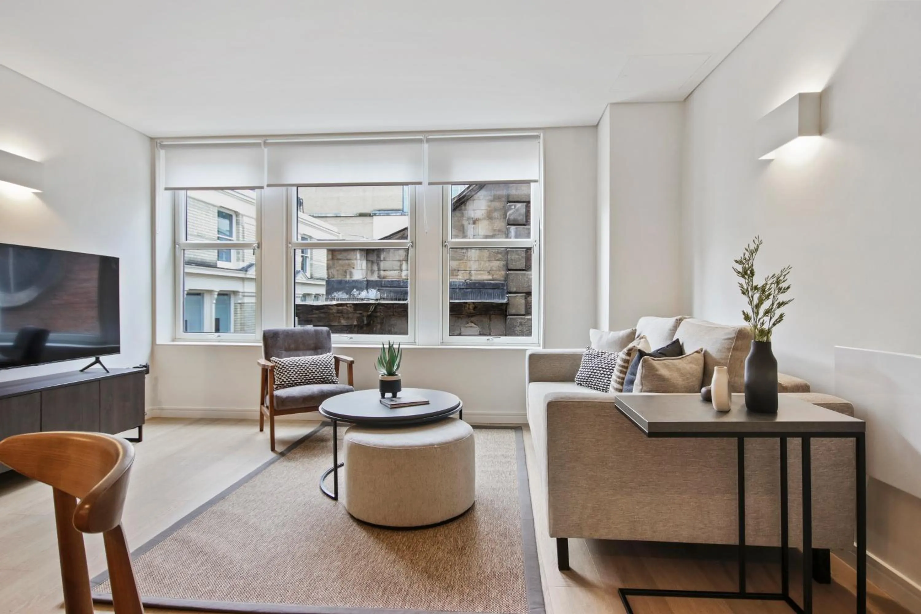 Seating area in Bow Lane by Aeria Apartments