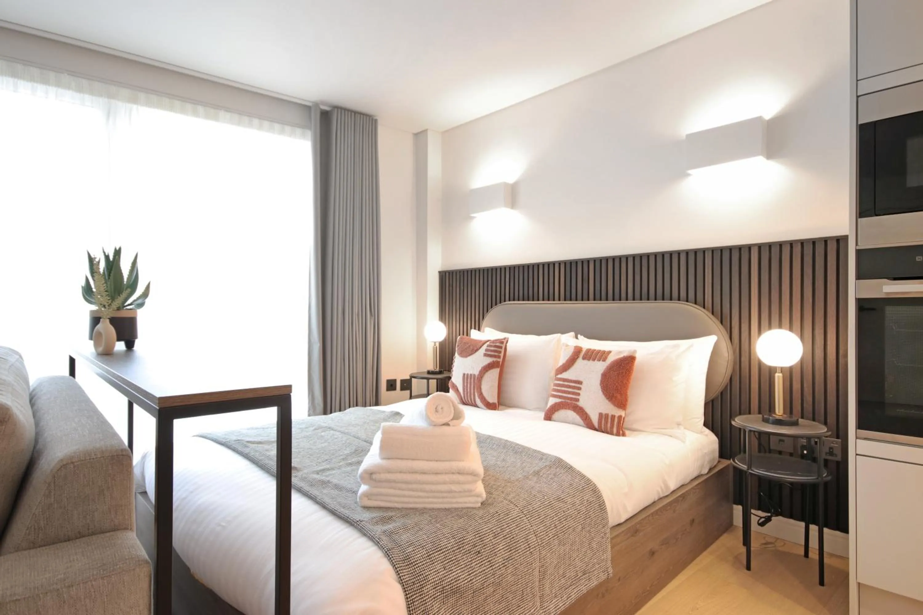 Bed in Bow Lane by Aeria Apartments